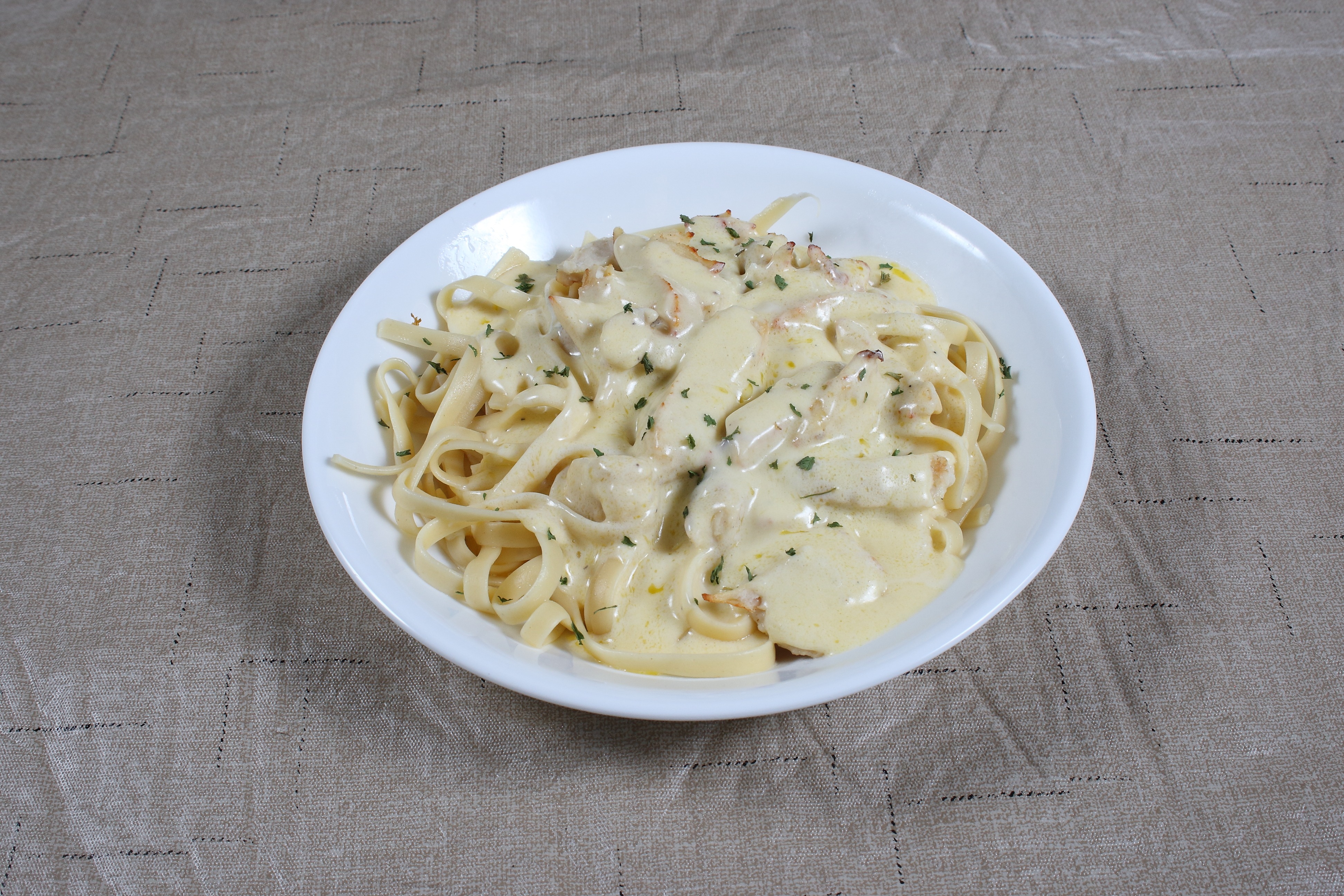 Order Fettuccine Alfredo with Chicken food online from Village Pizza store, Tega Cay on bringmethat.com