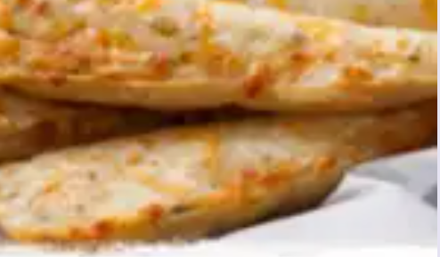 Order Garlic Bread with Cheese food online from Round Table Pizza store, San Jose on bringmethat.com