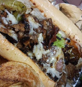 Order Slow-Cooked Philly Cheesesteak food online from Casey's Bistro store, Burlington on bringmethat.com