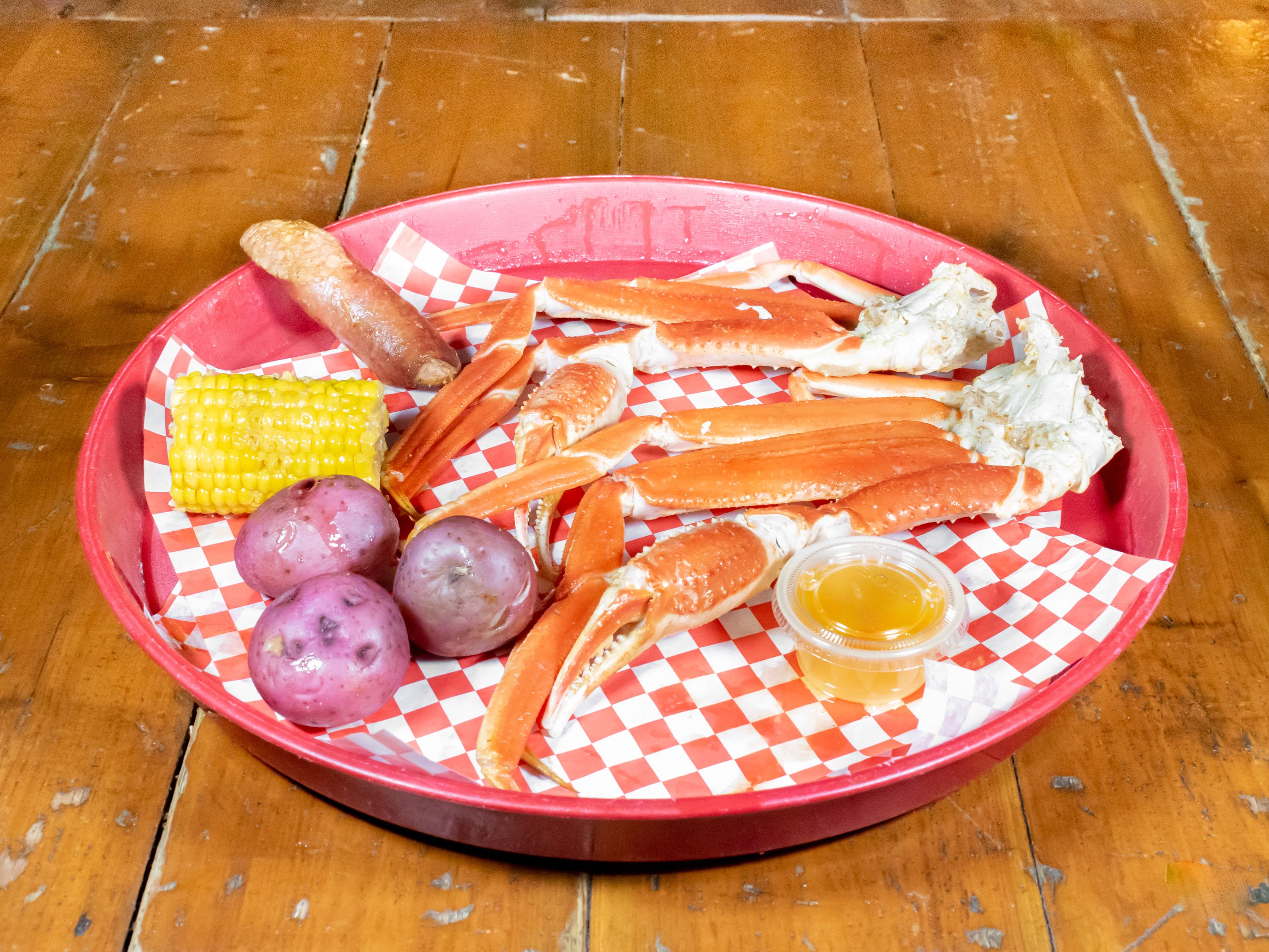 Order Boiled Snow Crab Legs food online from Bayou Kitchen Crawfish Kings store, Houston on bringmethat.com
