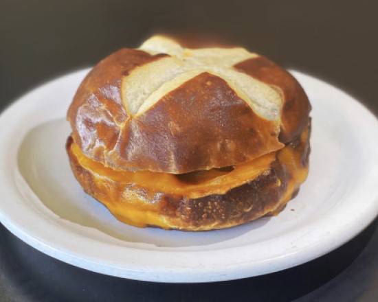 Order Pretzel Bun Sandwich - Cheese Melt food online from Sweetwaters Coffee & Tea store, Naperville on bringmethat.com