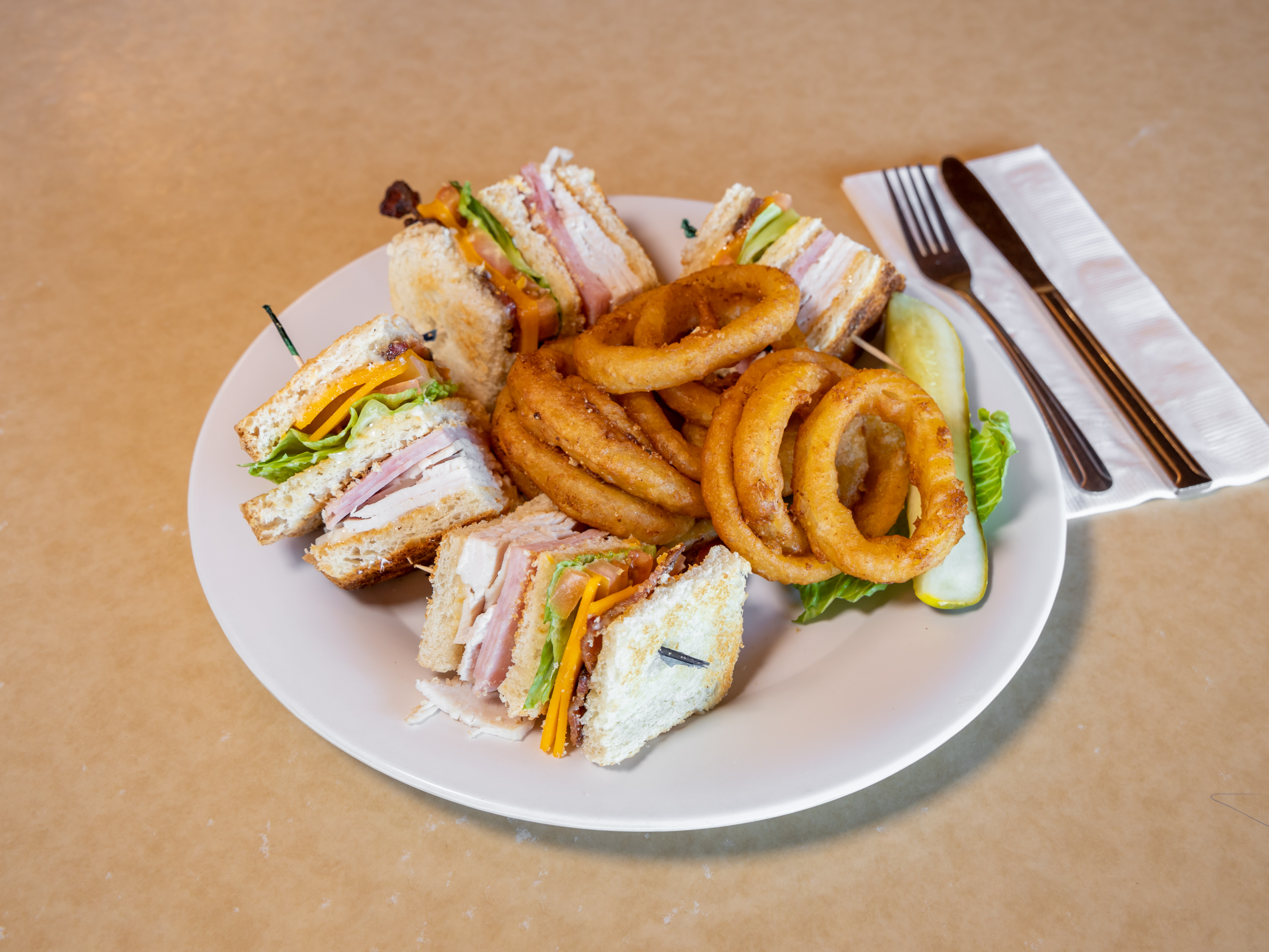 Order Classic Club Sandwich food online from Sloan Restaurant store, Indio on bringmethat.com
