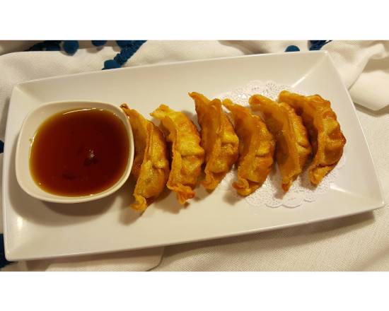 Order Pot Stickers (Gyoza) (6 pcs) food online from Thai Elephant store, Cleveland on bringmethat.com