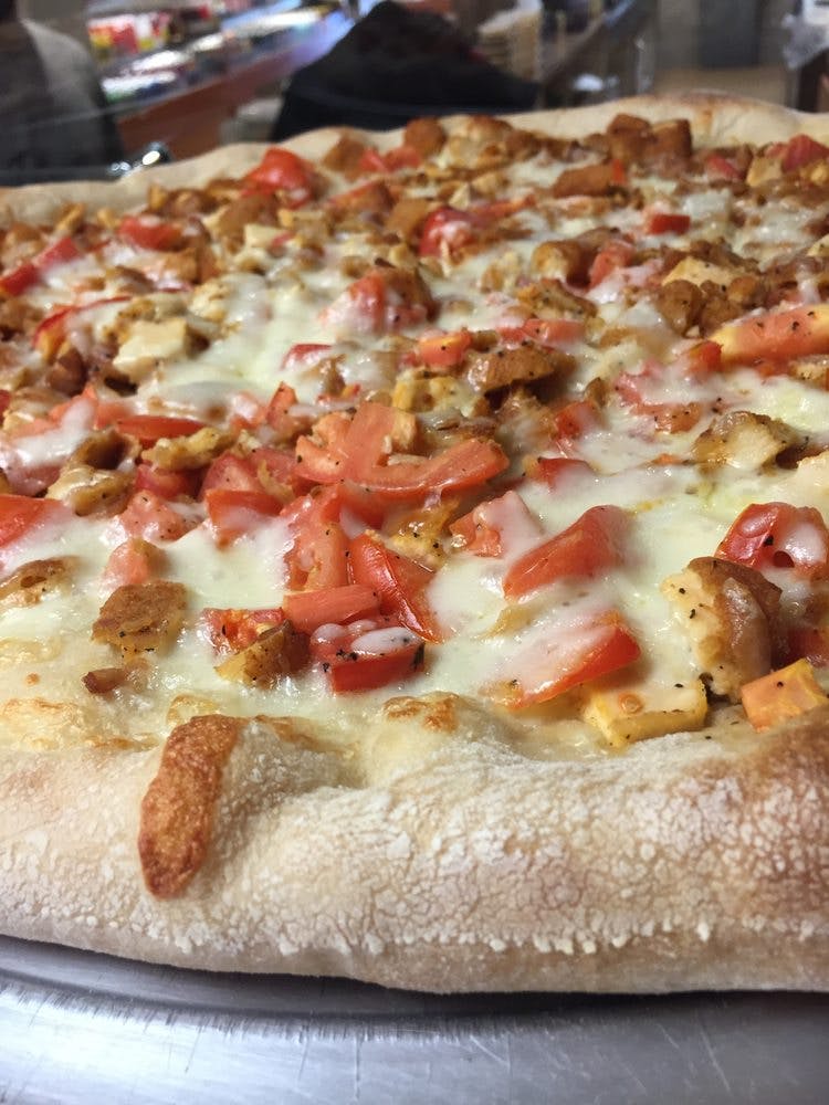 Order Chicken & Tomato Pizza - Large 16'' (8 Slices) food online from Marc's Deli & Pizzeria store, Park Ridge on bringmethat.com