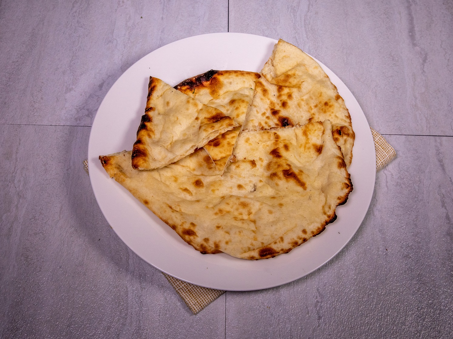 Order Naan food online from Indian Kitchen store, Fort Worth on bringmethat.com