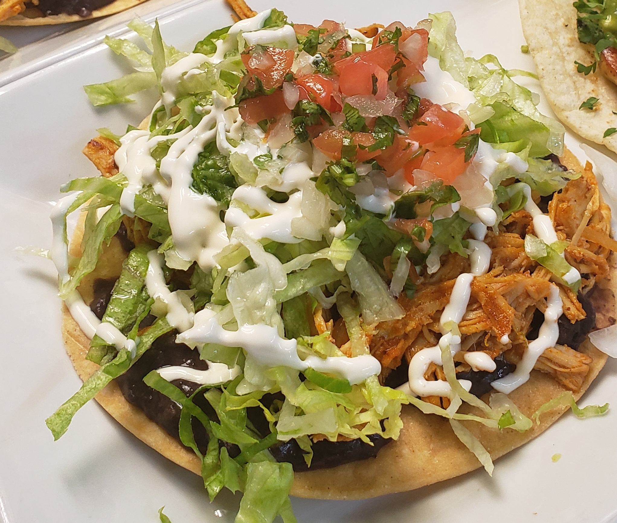 Order Tinga de Pollo Tostada food online from Don Chile Mexican Grill-Southern Blvd store, Bronx on bringmethat.com