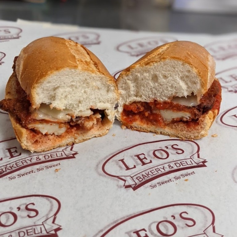 Order Chicken Parmesan (Hot Sub) food online from Leo Bakery & Deli store, East Rochester on bringmethat.com