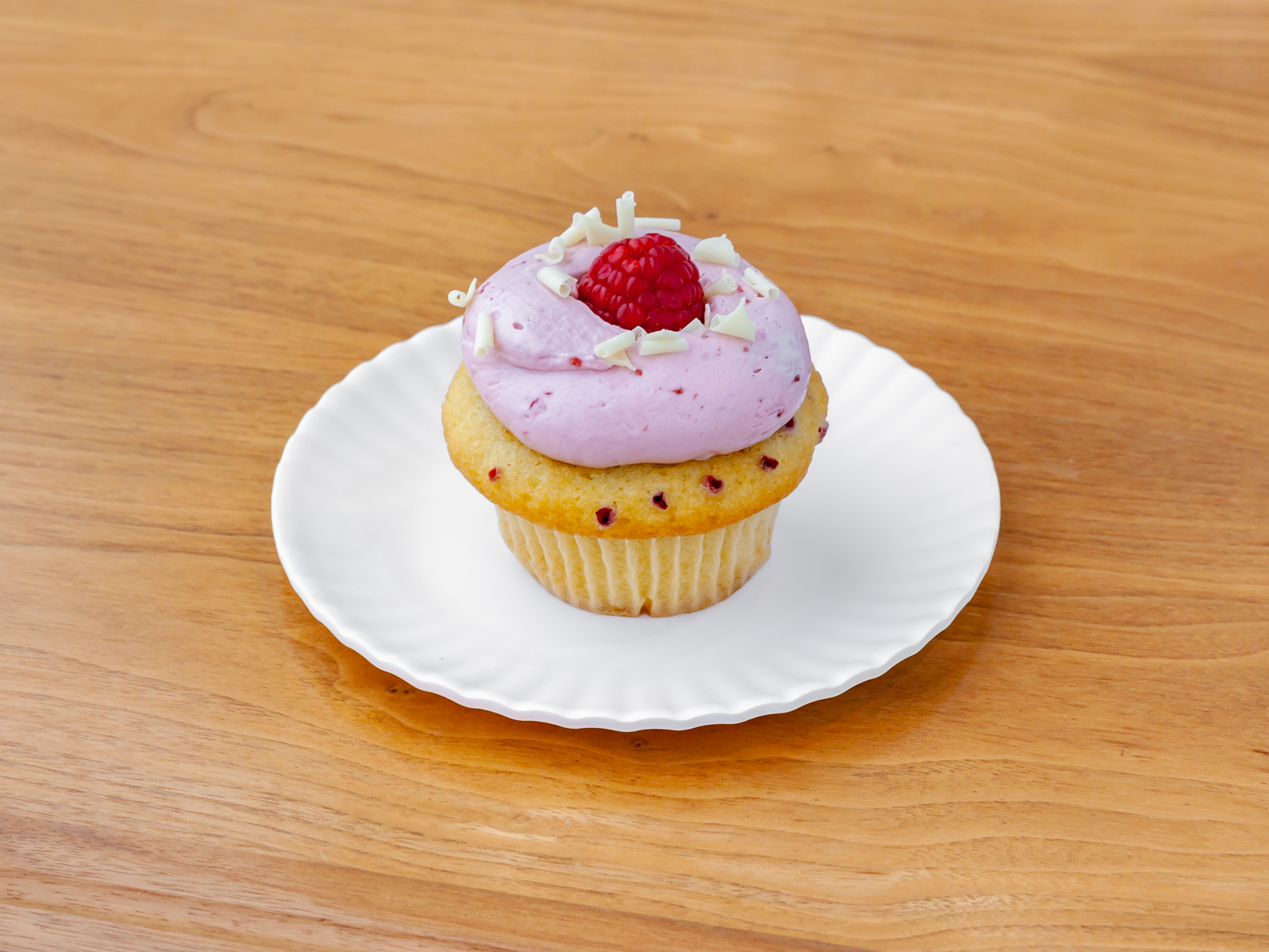 Order White Chocolate Raspberry food online from Molly's Cupcakes store, Chicago on bringmethat.com