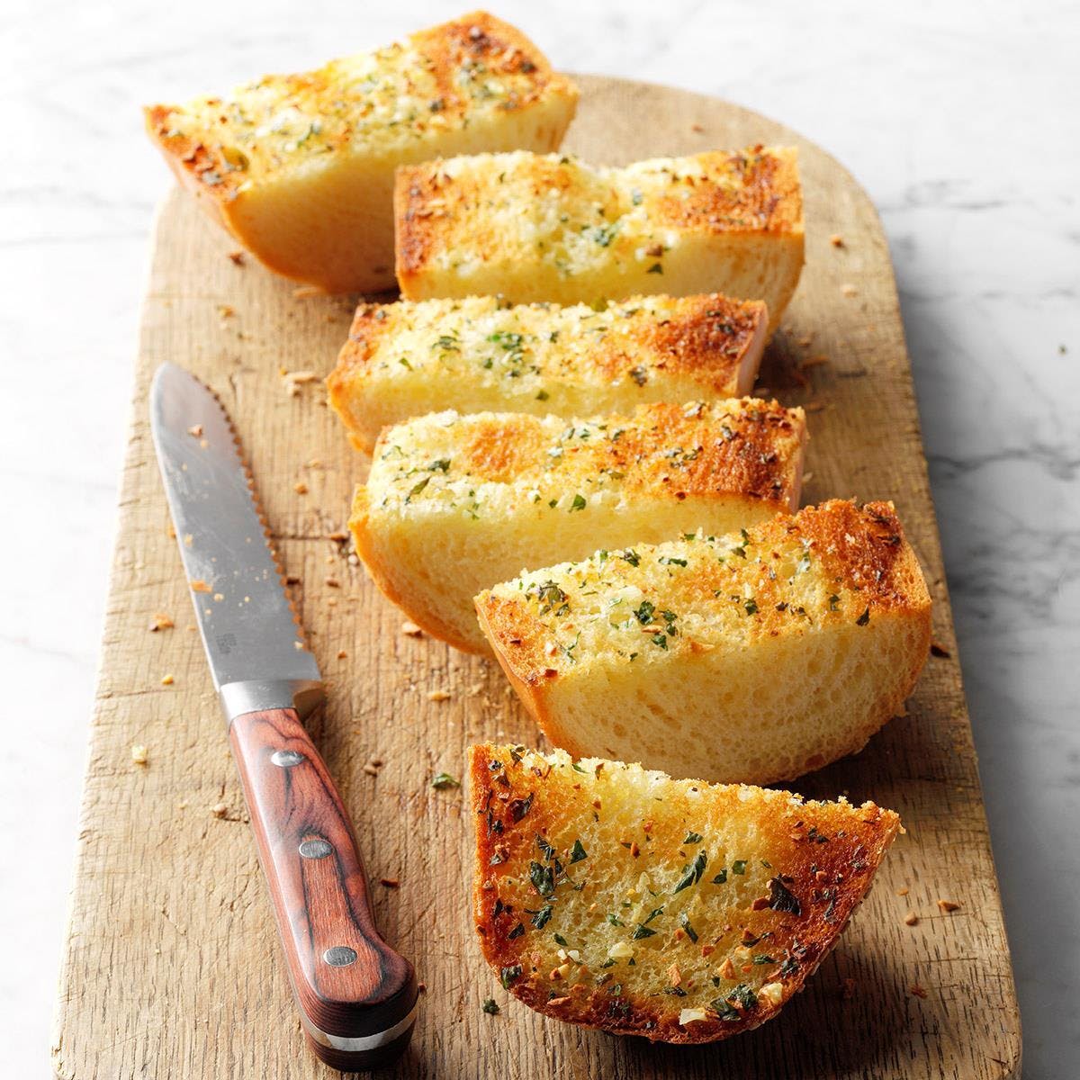 Order Garlic Bread - Small food online from Niko's Pizza House store, Worcester on bringmethat.com