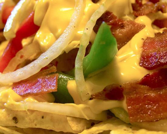 Order Super Cheesy Bacon Nachos food online from Bobablastic store, Dundee on bringmethat.com