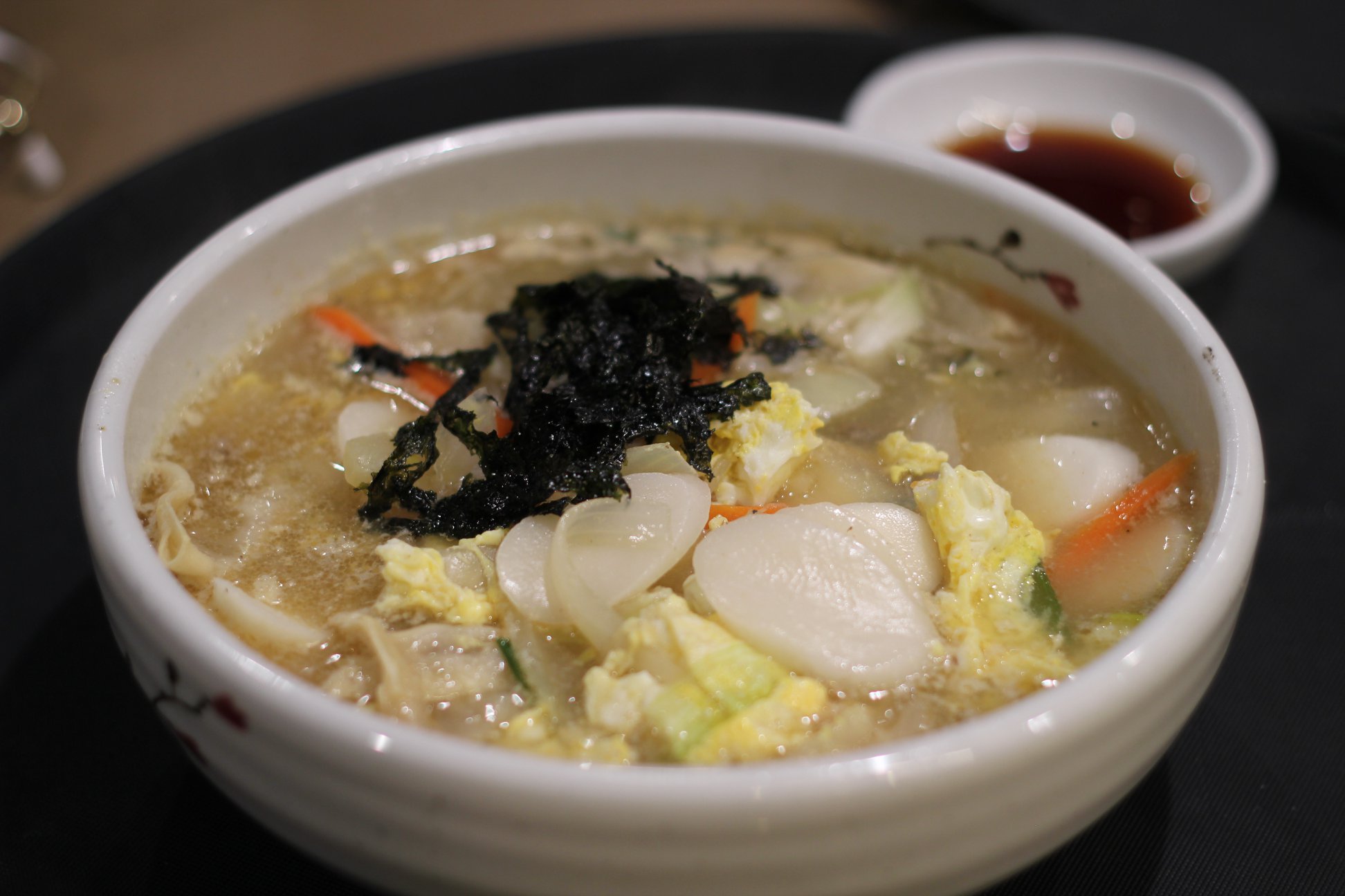 Order Dumpling Rice Cake Soup food online from Spoon Korean Bistro store, Fremont on bringmethat.com