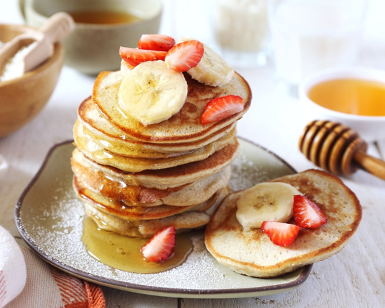 Order Strawberry and Banana Pancakes food online from Breakfast Snob store, San Francisco on bringmethat.com