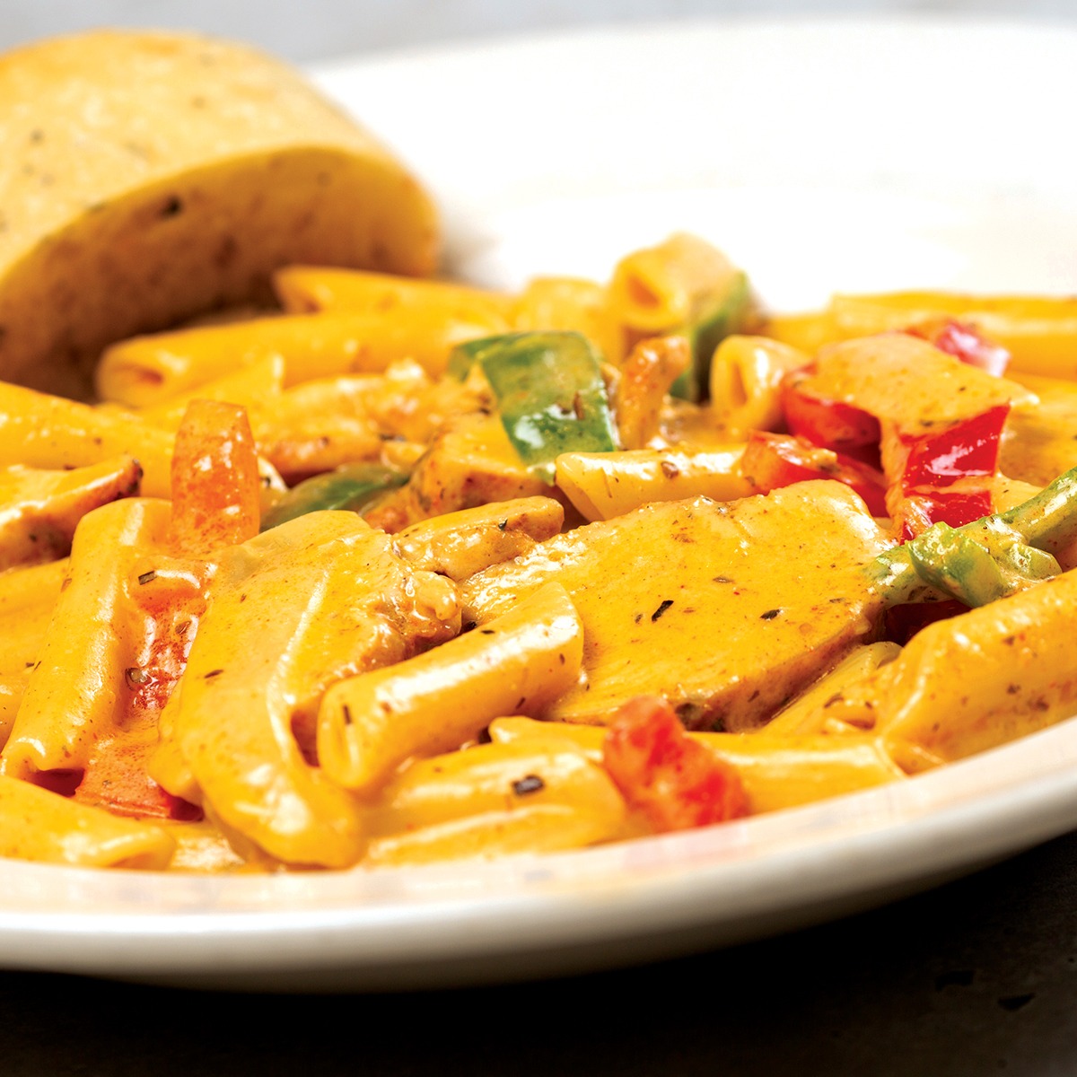 Order Roasted Chicken Penne food online from Brixx Wood Fired Pizza store, Wilmington on bringmethat.com