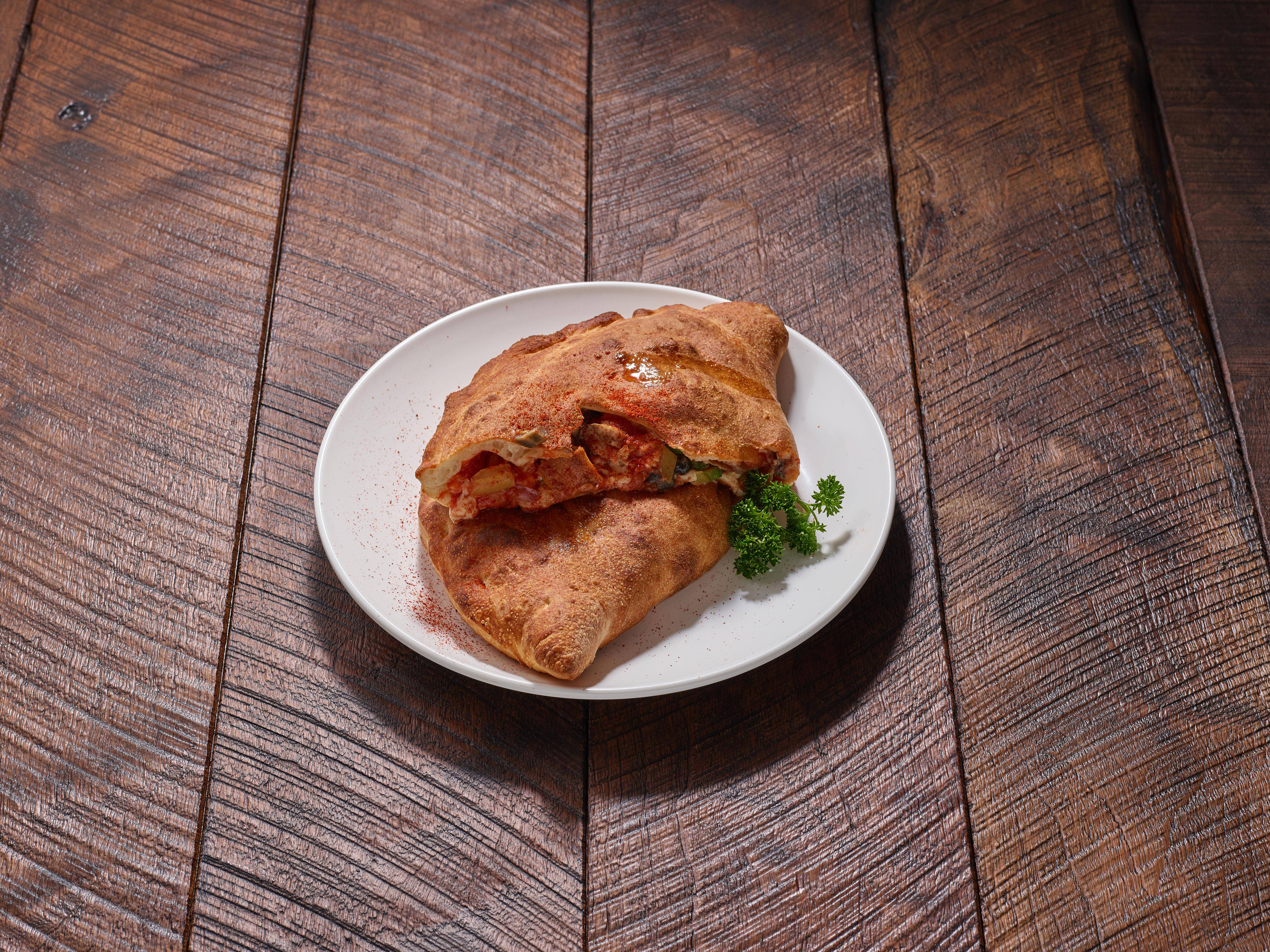 Order Veggie Calzone food online from Pizza Love store, Oakland on bringmethat.com