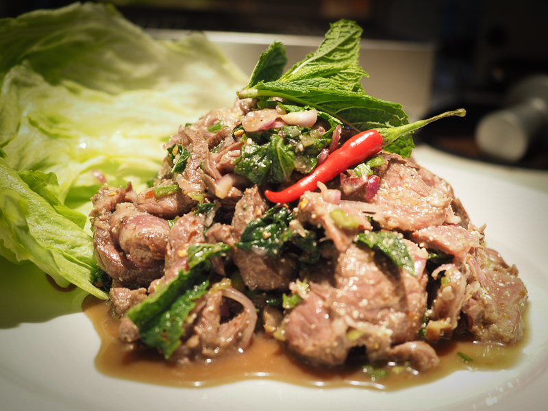 Order 20. Nam Tok Salad food online from Aura Thai store, Long Beach on bringmethat.com