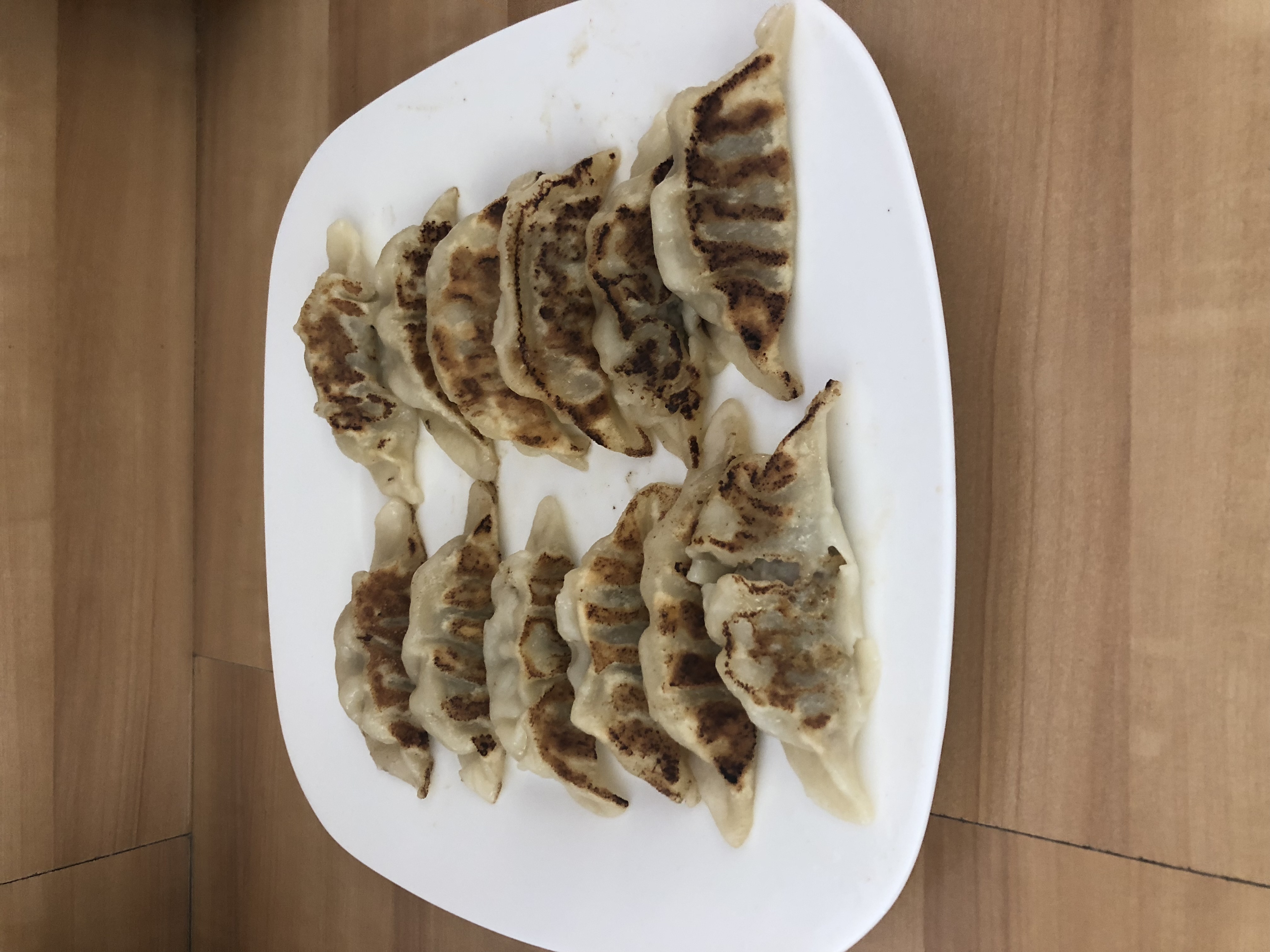Order 10 Pieces Homemade Potstickers （煎饺） food online from China Impression Restaurant store, Costa Mesa on bringmethat.com