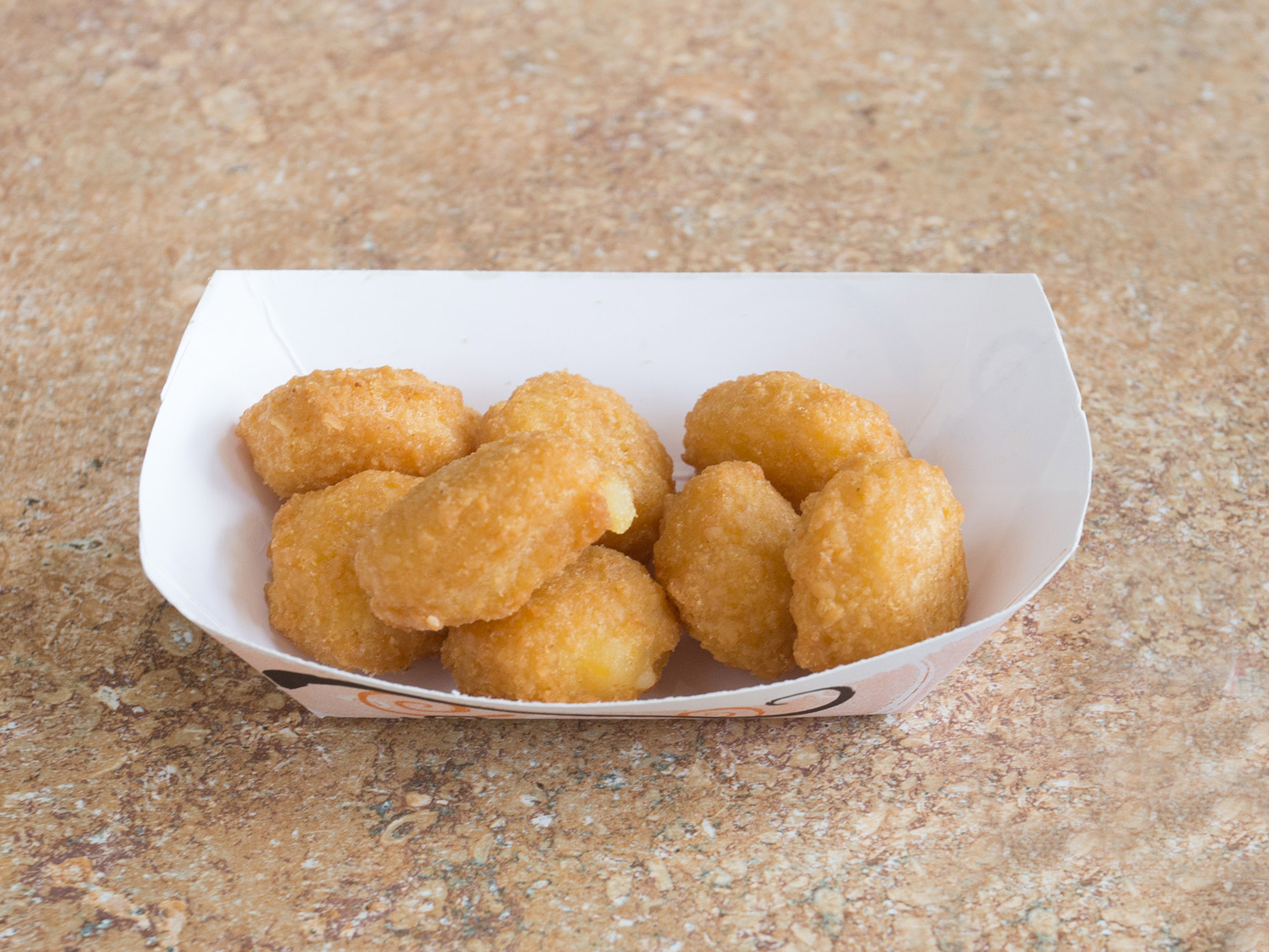 Order Corn Nuggets food online from Chicken Express store, Austin on bringmethat.com