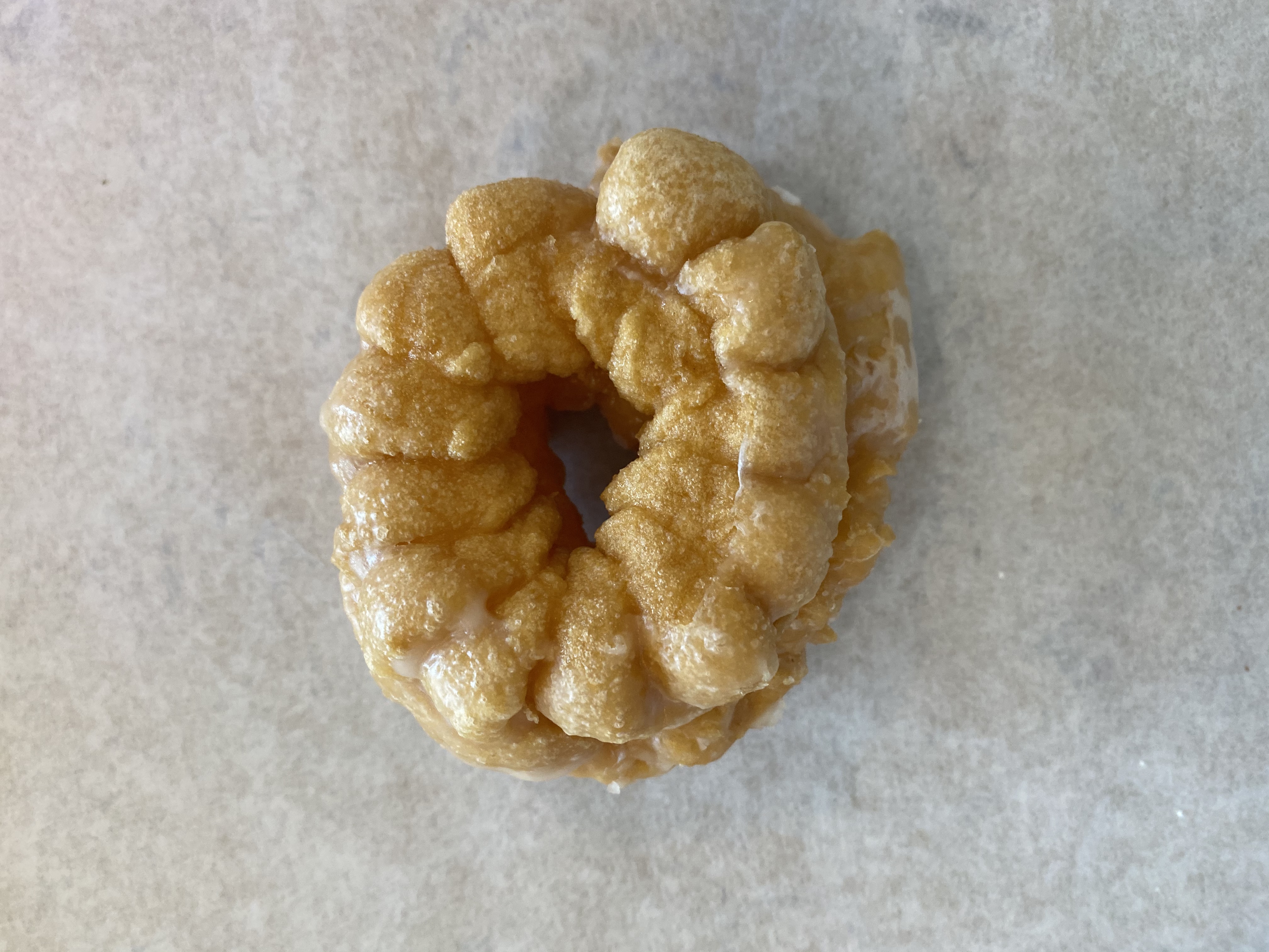 Order French Cruller food online from Sesame Donuts store, Portland on bringmethat.com