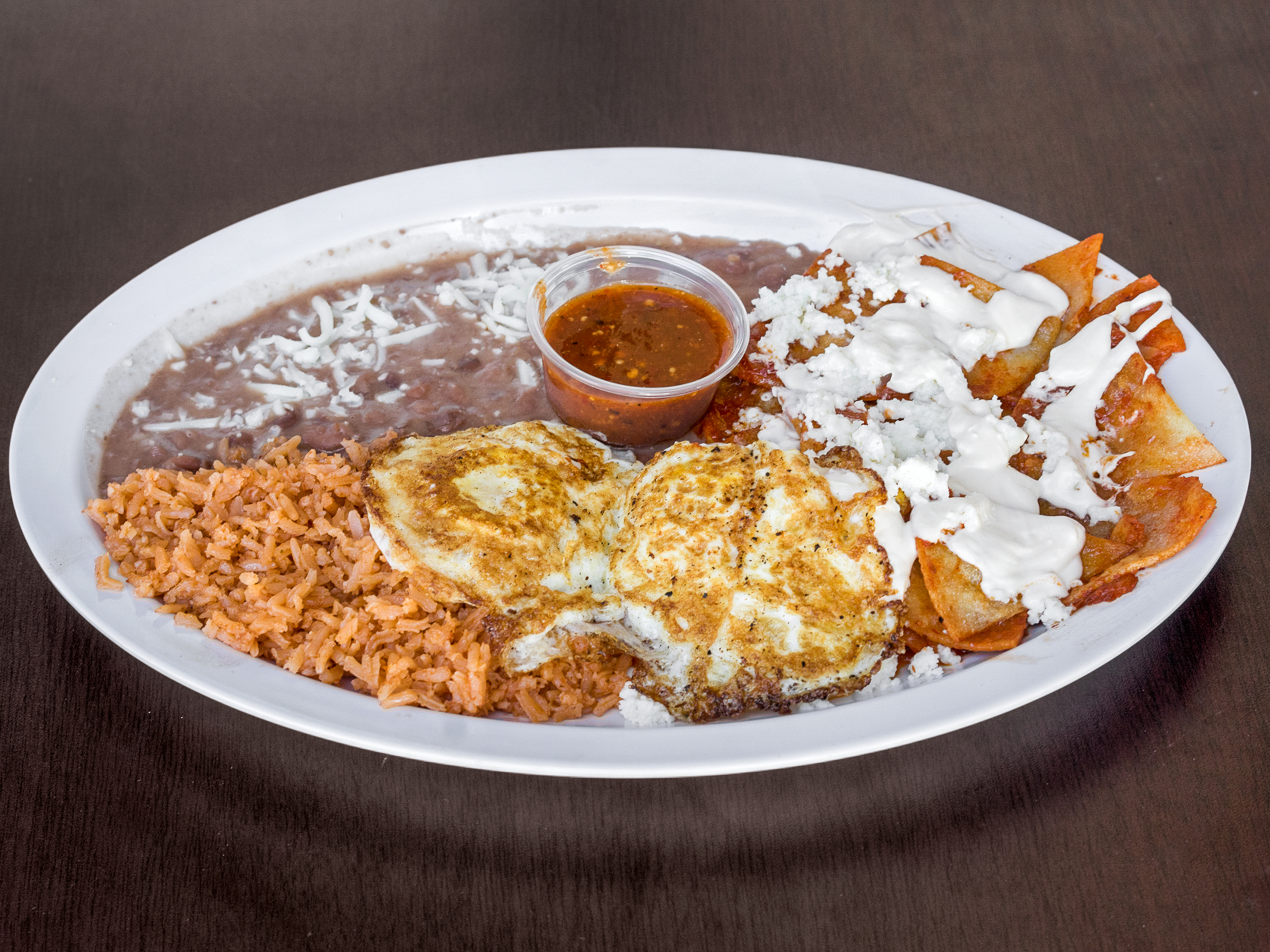 Order Chilaquiles food online from Ana Restaurant store, Fowler on bringmethat.com