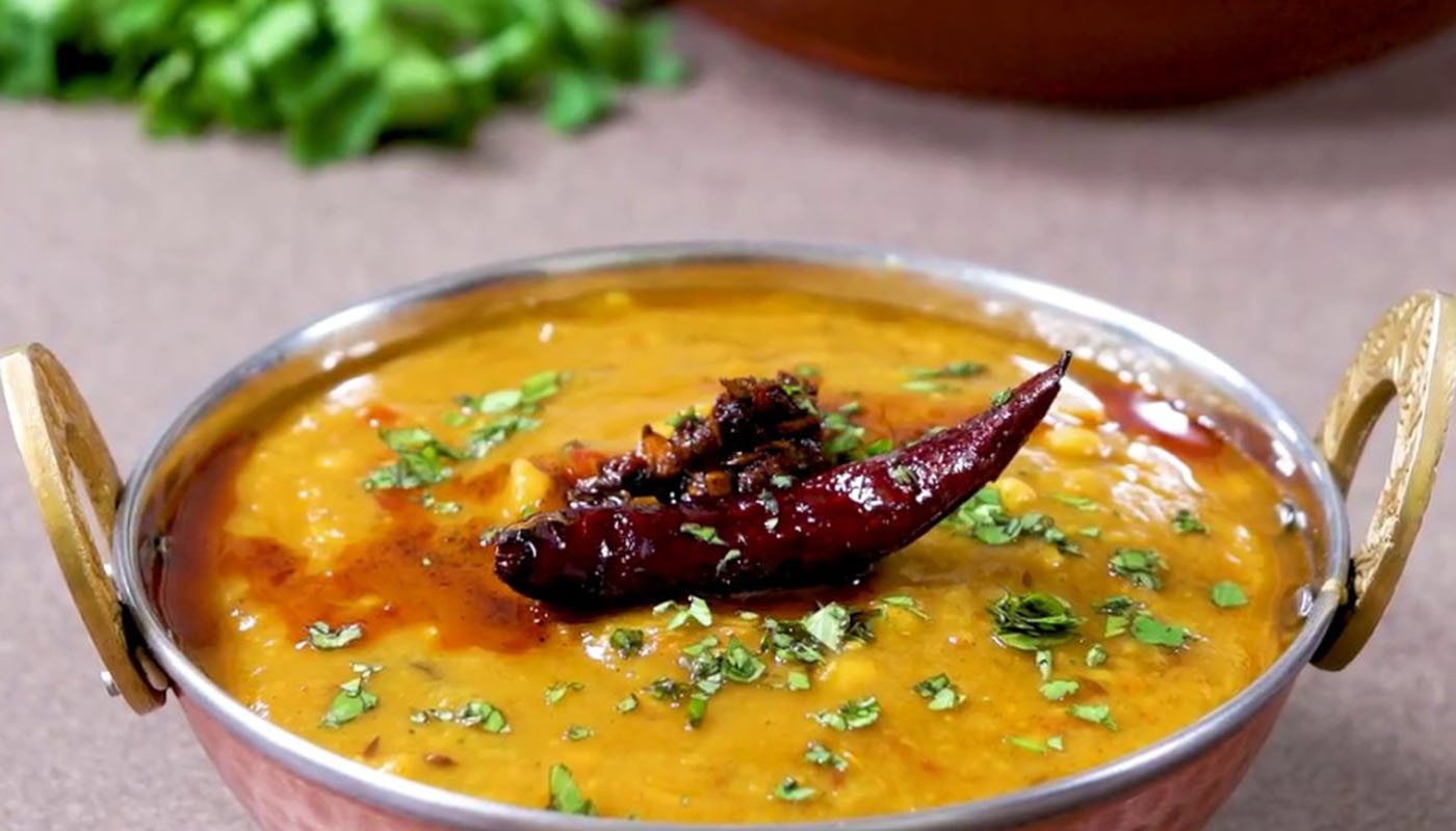 Order Tadka Daal food online from Momo King store, Mountain View on bringmethat.com