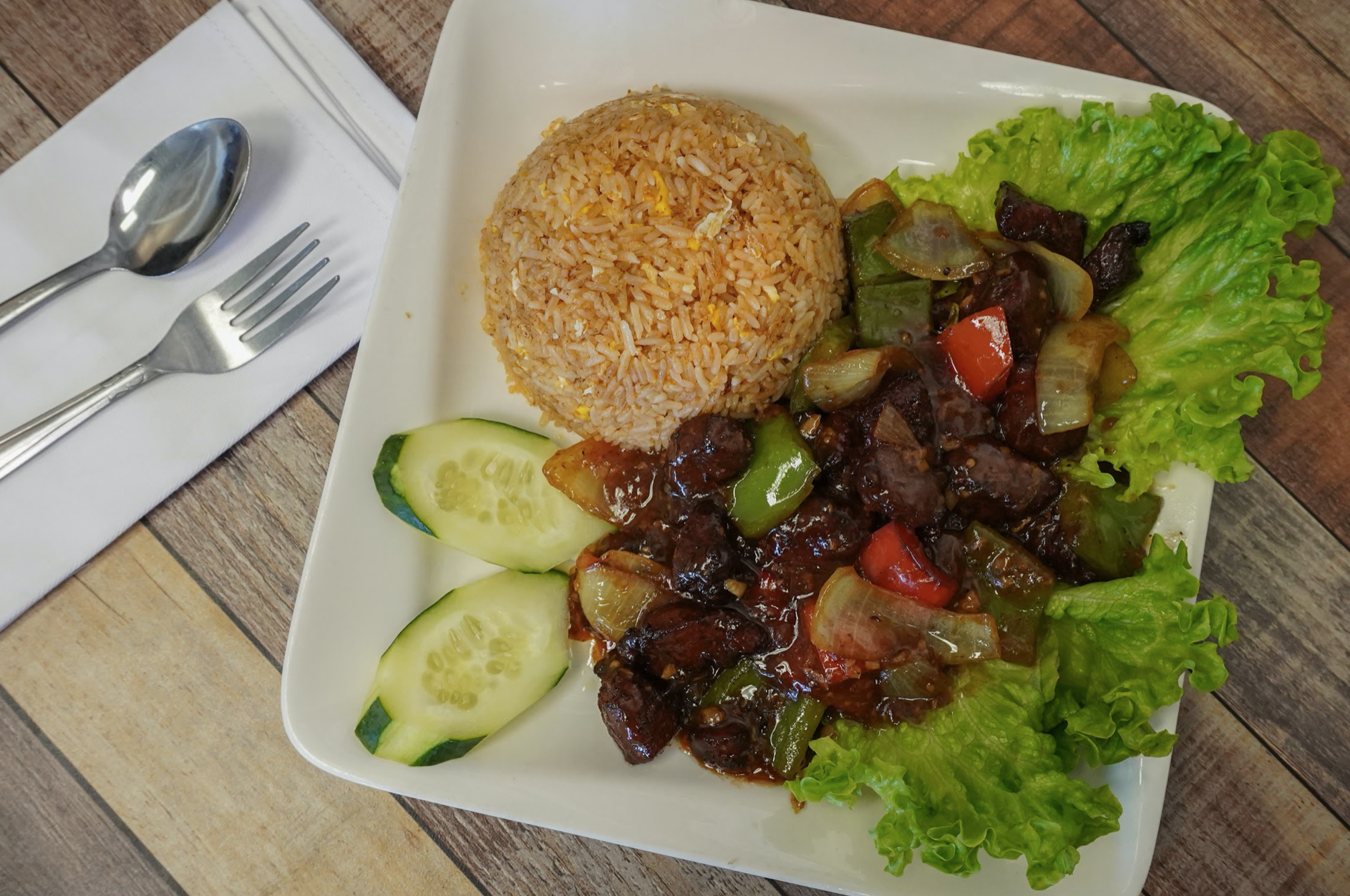 Order 42. French Style Fried Beef Cubes on Tomato Sauced Rice. food online from Pho LTK store, El Monte on bringmethat.com