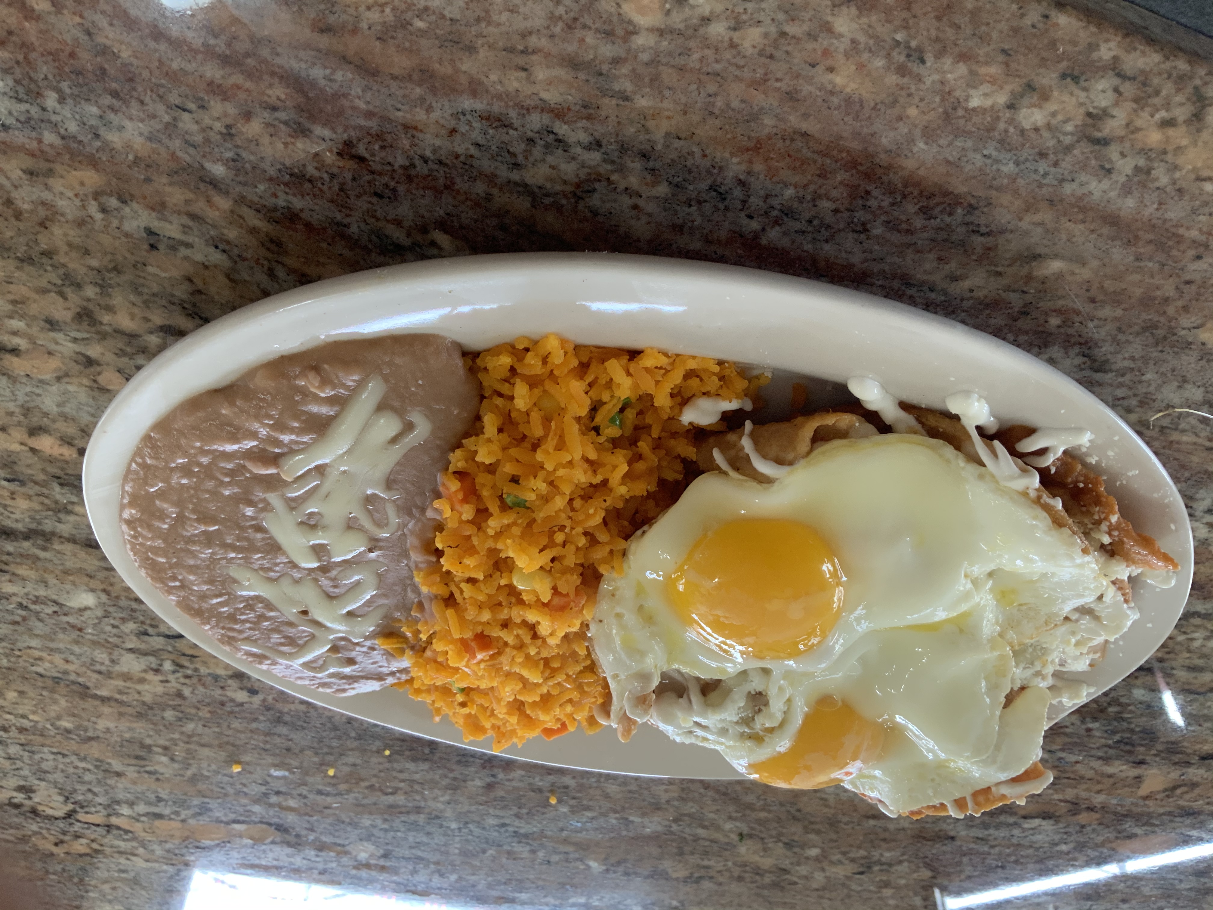 Order Chilaquiles with Eggs food online from La Catrina Restaurant store, Chicago on bringmethat.com