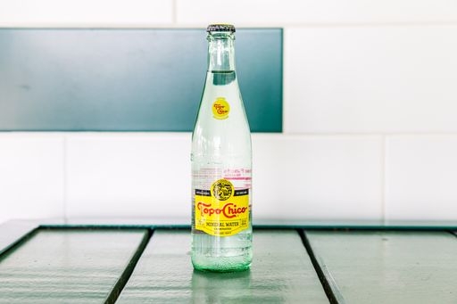 Order Topo Chico food online from The Taco Stand store, Houston on bringmethat.com