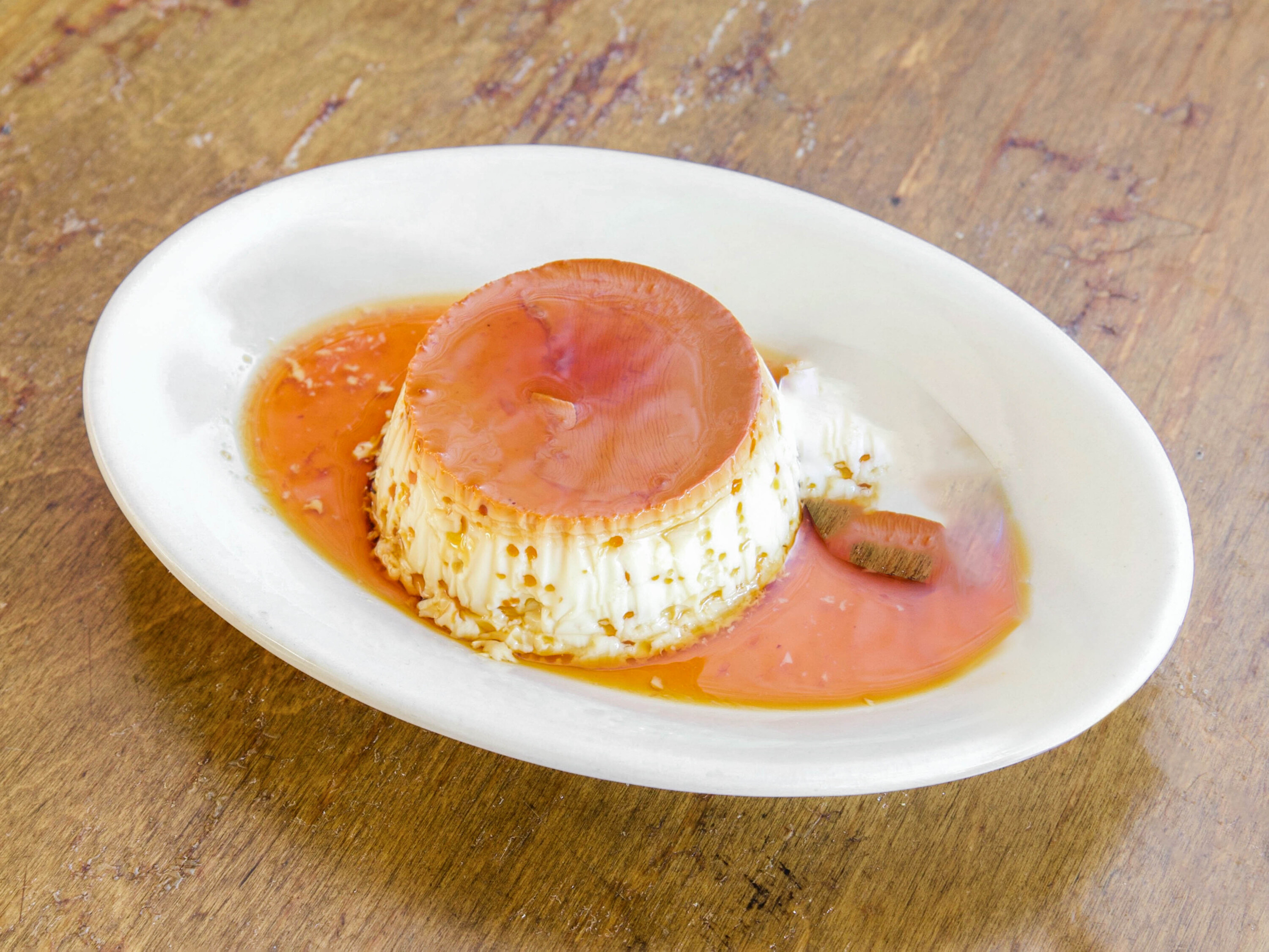 Order Flan food online from Picaro Cafe store, San Francisco on bringmethat.com