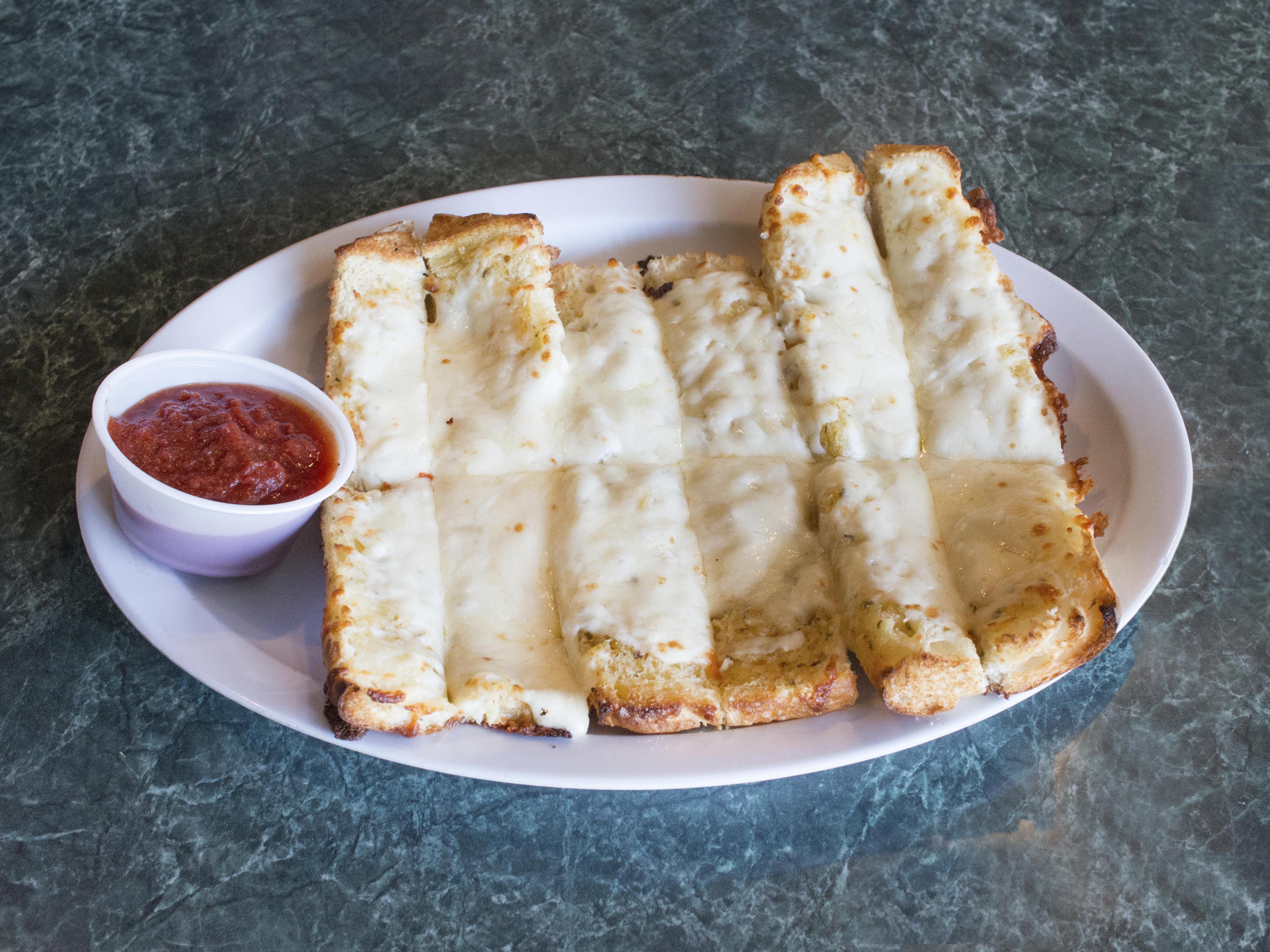 Order Mancino's Bread Sticks food online from Mancinos Pizza and Grinders of Taylor store, Taylor on bringmethat.com