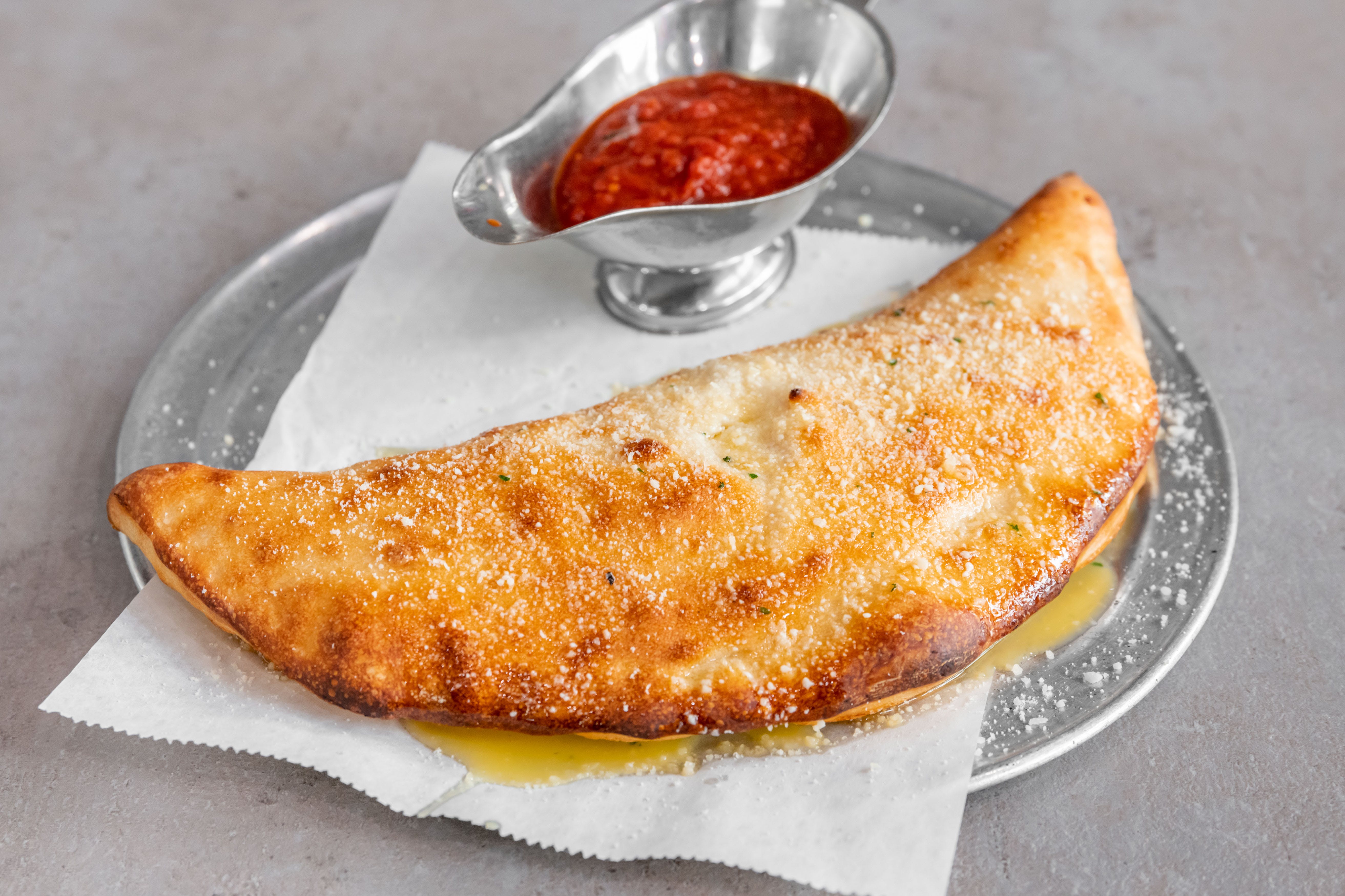 Order Calzone - Small food online from Scuotto's Pizza and Pasta Inc. store, Sunrise on bringmethat.com