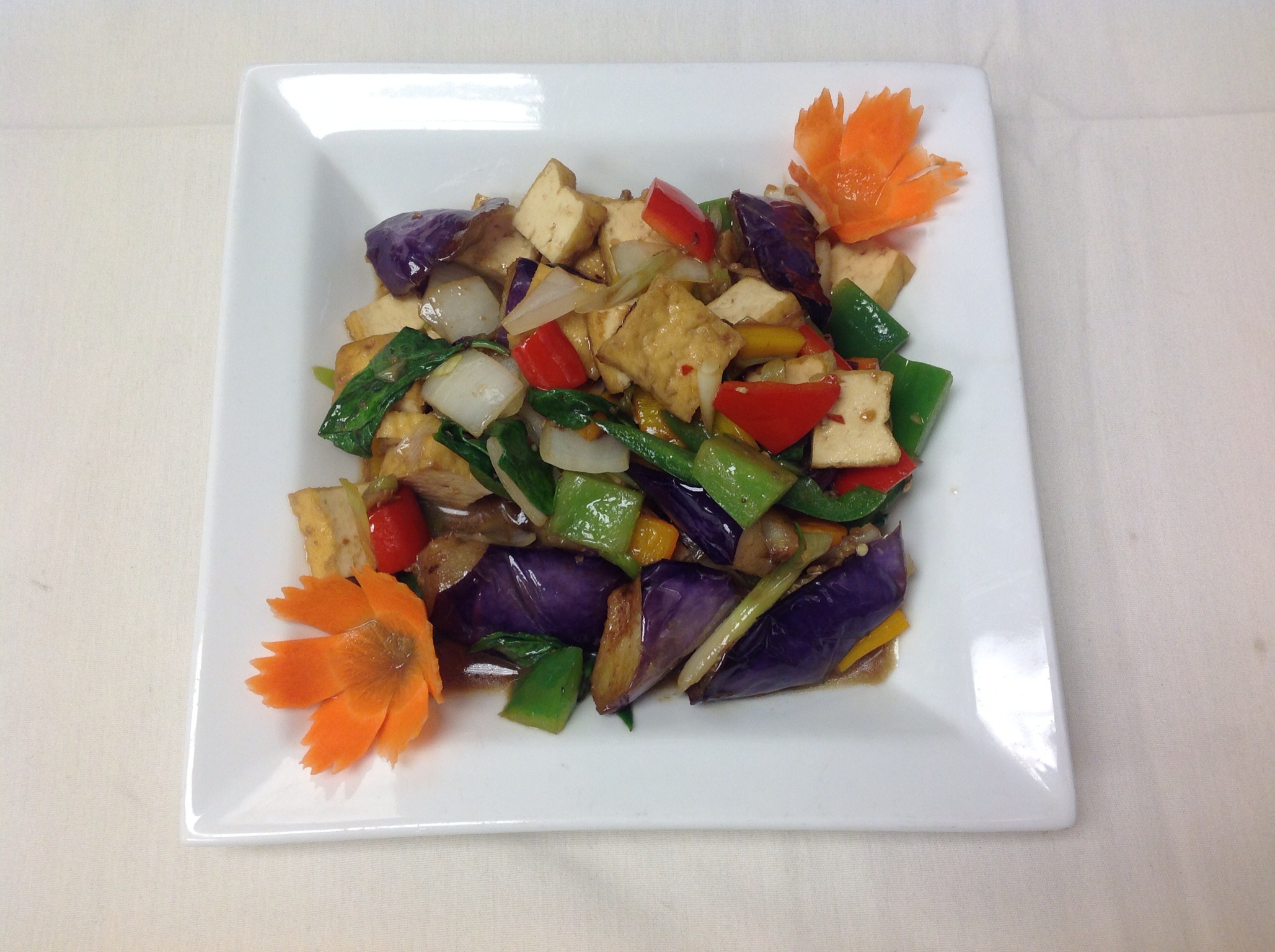 Order 42. Basil Eggplant food online from Nine Thai Cuisine store, Chicago on bringmethat.com