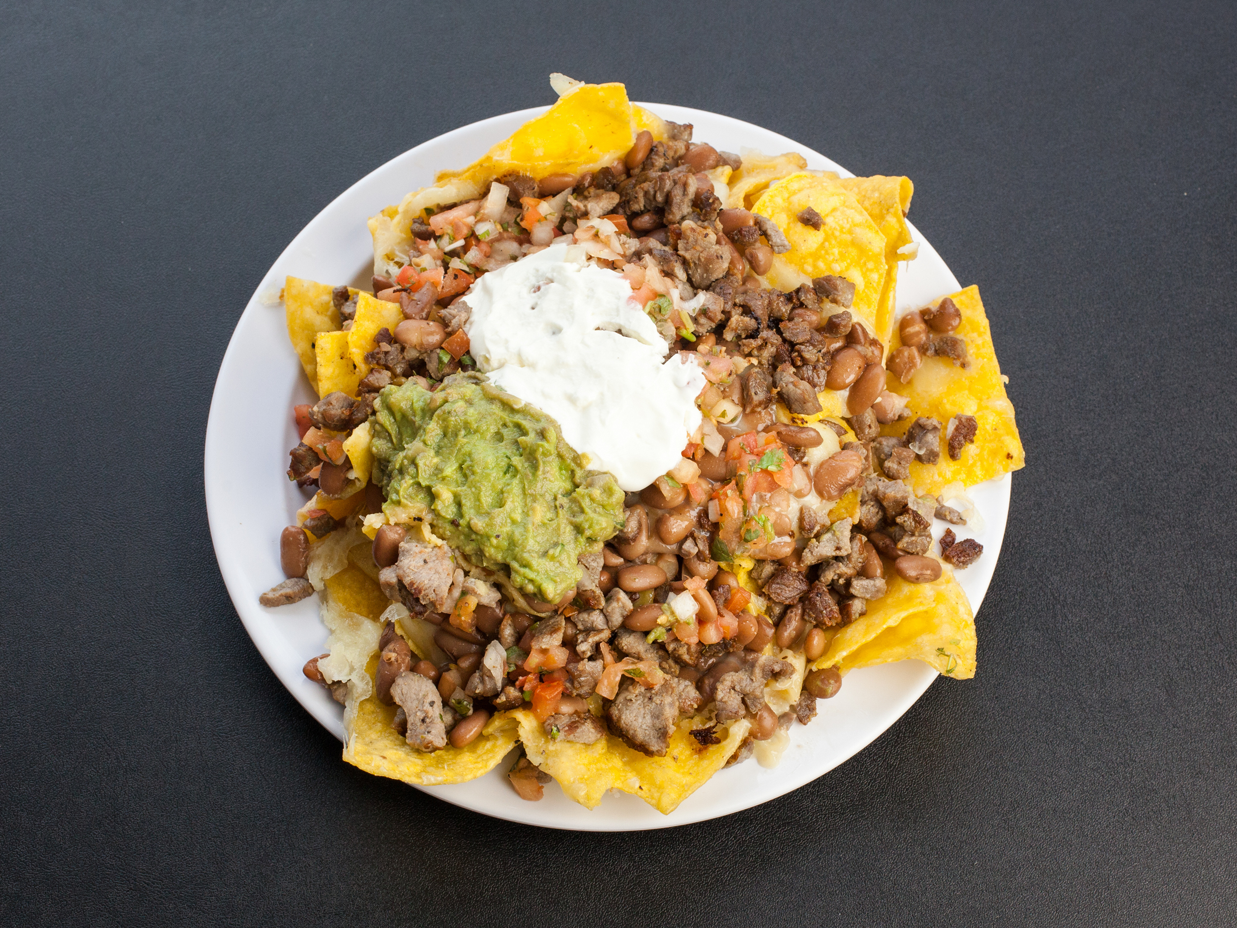 Order Macho Nachos food online from Tulum Mexican Cuisine store, Seattle on bringmethat.com