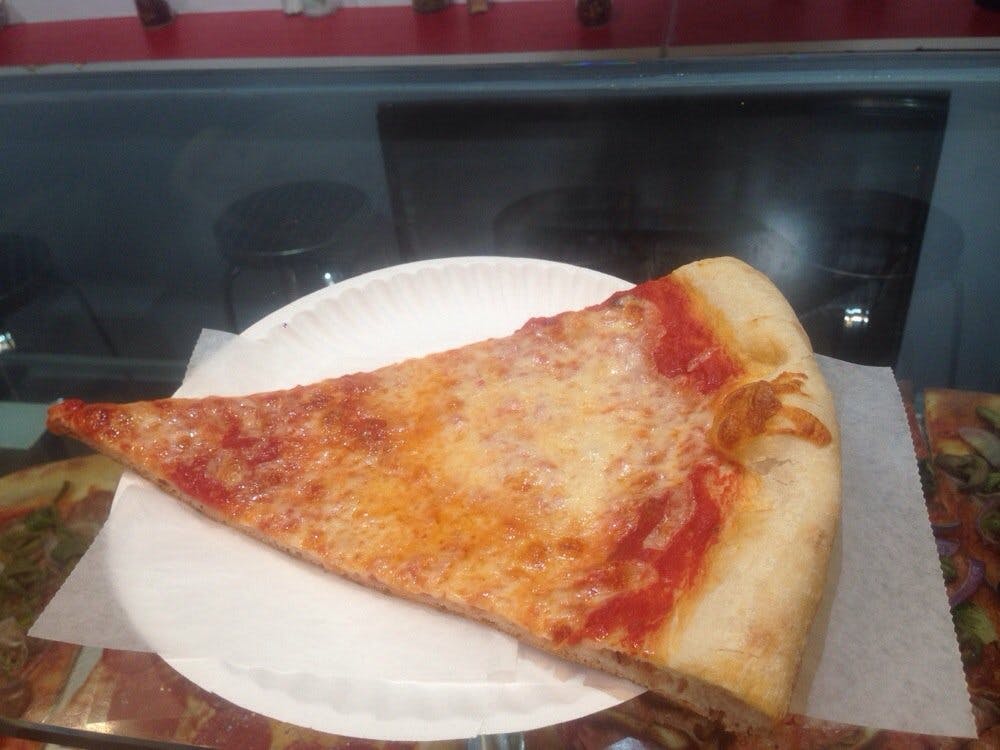 Order Regular Cheese Pizza Slice - Slice food online from Little gio's pizza store, New York on bringmethat.com