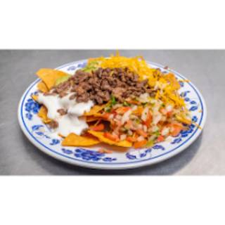 Order Super Nachos food online from Memos Mexican Food Restaurant store, Seattle on bringmethat.com