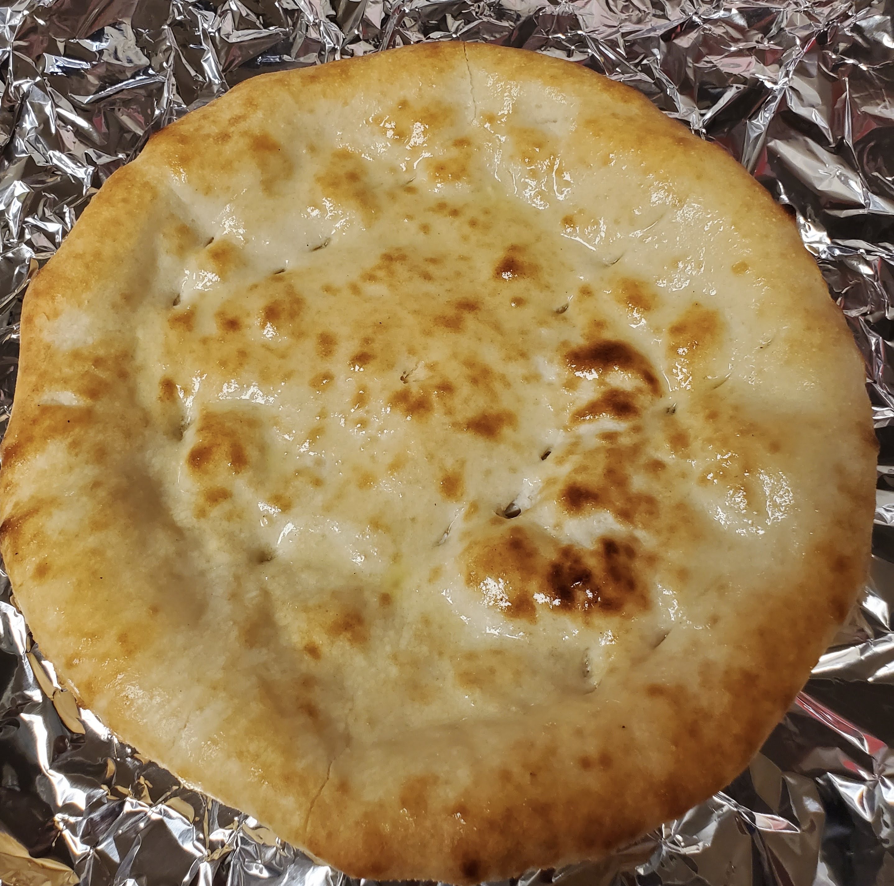 Order Plain Naan food online from Simple Pakistani store, Frederick on bringmethat.com