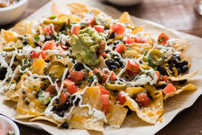 Order Half Nachos food online from Sharky Woodfired Mexican Grill store, Woodland Hills on bringmethat.com