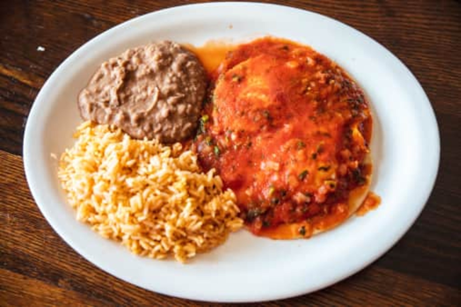 Order Huevos Rancheros food online from La Veracruzana Mexican Restaurant store, Northampton on bringmethat.com
