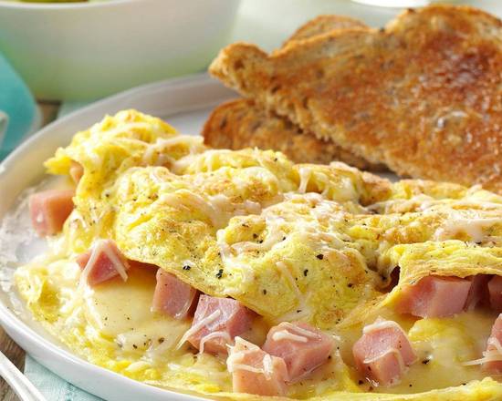 Order Meat & Cheese Omelette food online from Trolley Stop Cafe store, Dallas on bringmethat.com