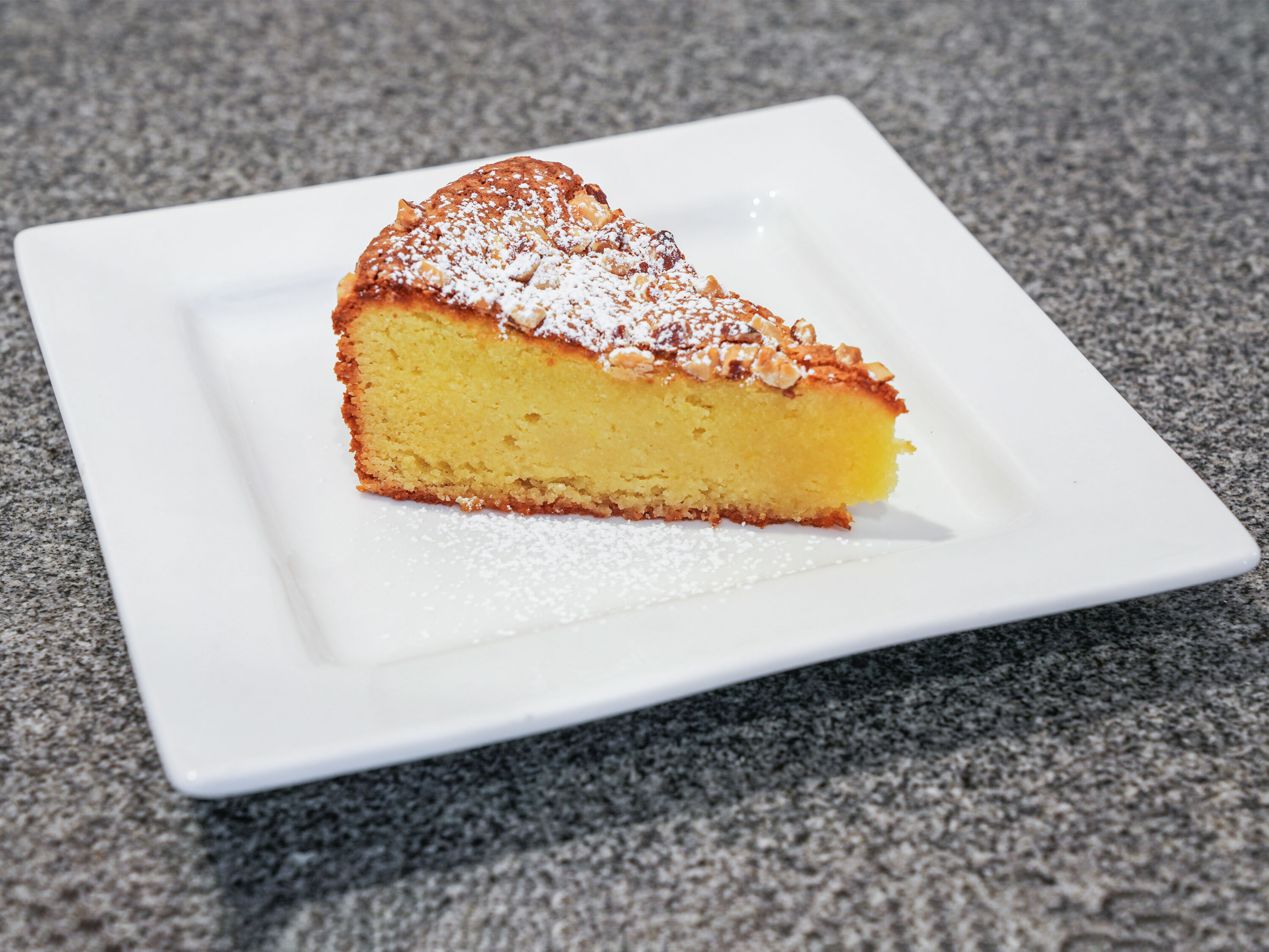Order Almond Cake  food online from Sweet Art Cafe store, Orange on bringmethat.com