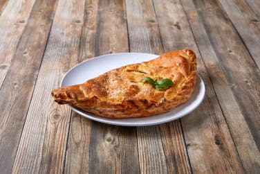 Order Calzone with Three Topping - Calzone food online from Giant Pizza King store, Chula Vista on bringmethat.com