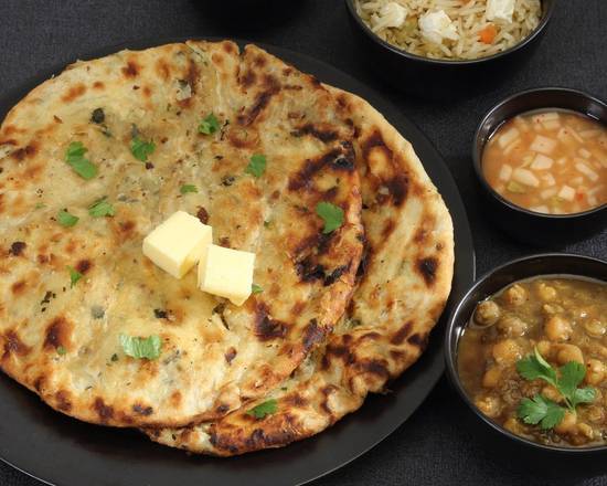 Order Onion Kulcha food online from Aroma Indian Restaurant store, Bloomington on bringmethat.com