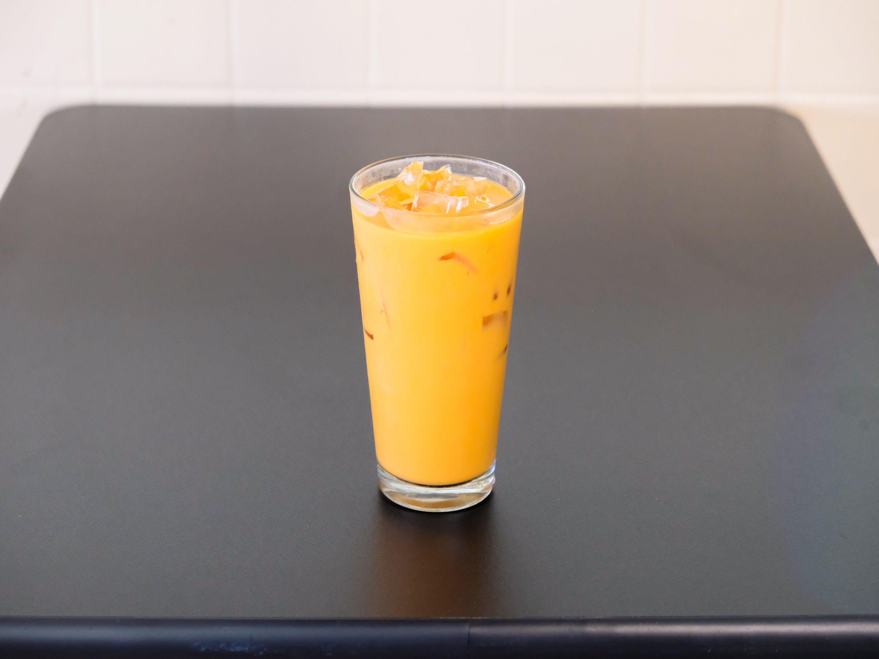 Order Thai Iced Tea food online from Green Bamboo Asian Vegetarian store, San Diego on bringmethat.com