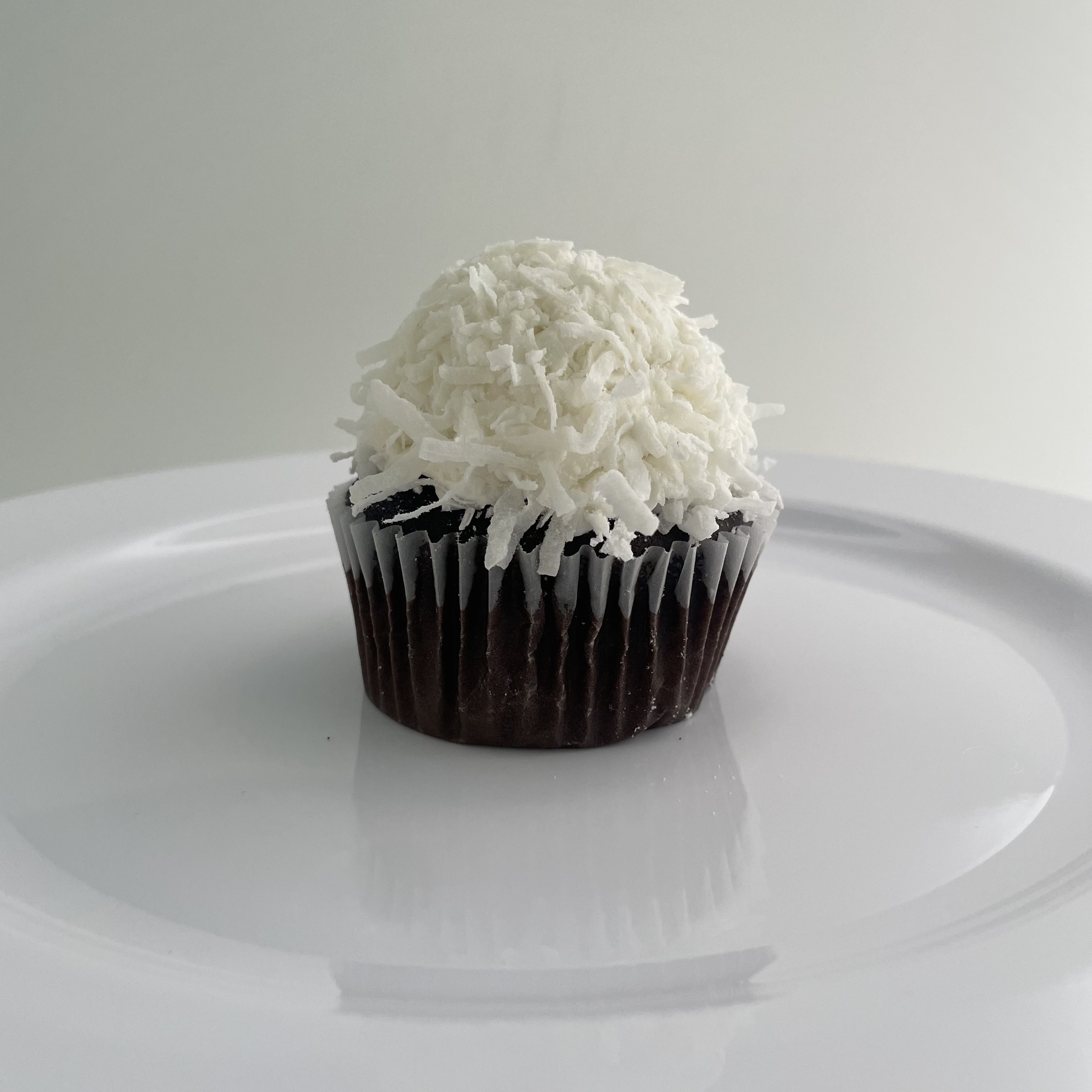 Order Chocolate Coconut Snowball Cupcake food online from The House of Cupcakes store, Princeton on bringmethat.com