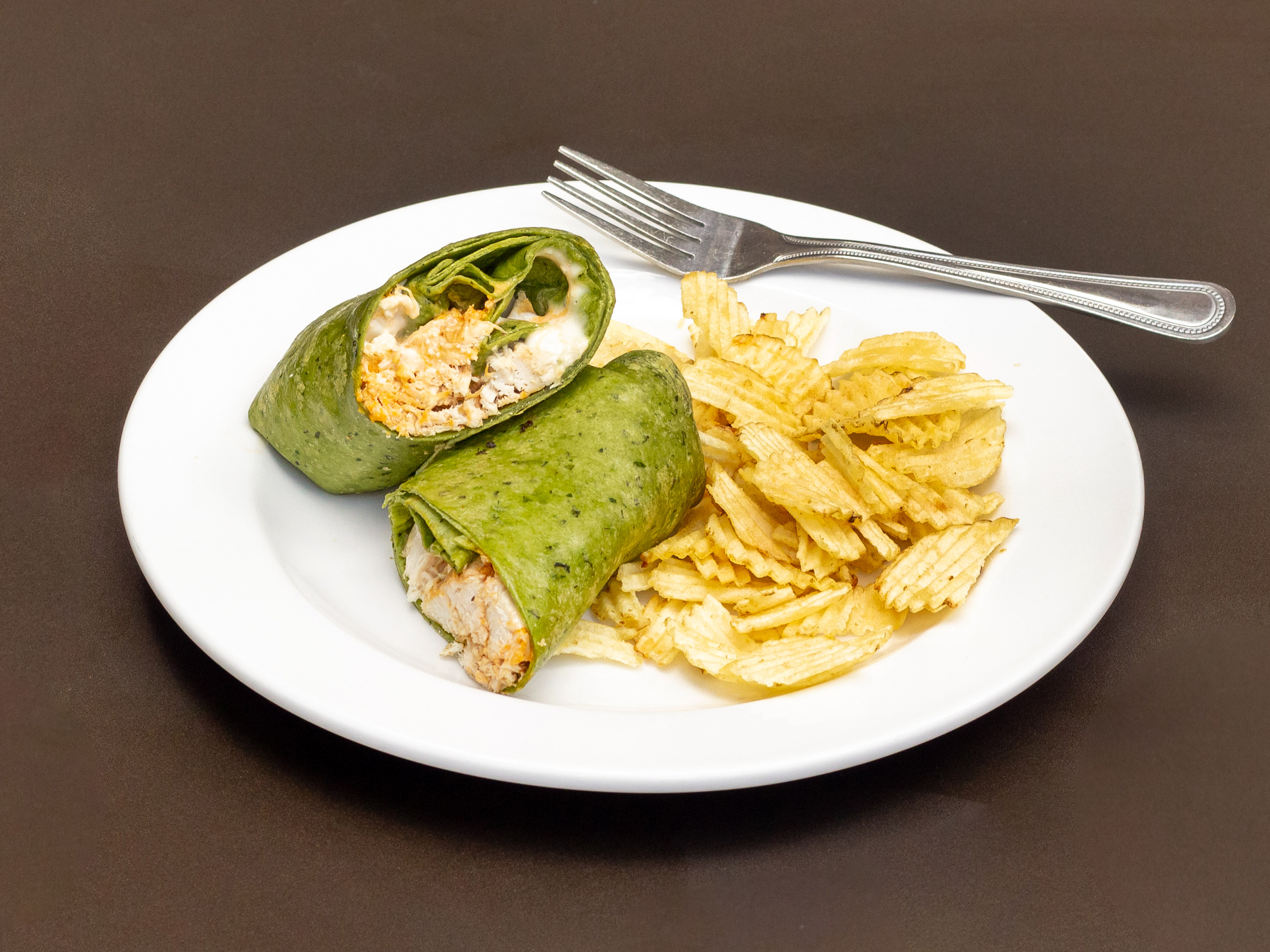 Order Buffalo Chicken Wrap food online from Famous Toastery store, Charlotte on bringmethat.com