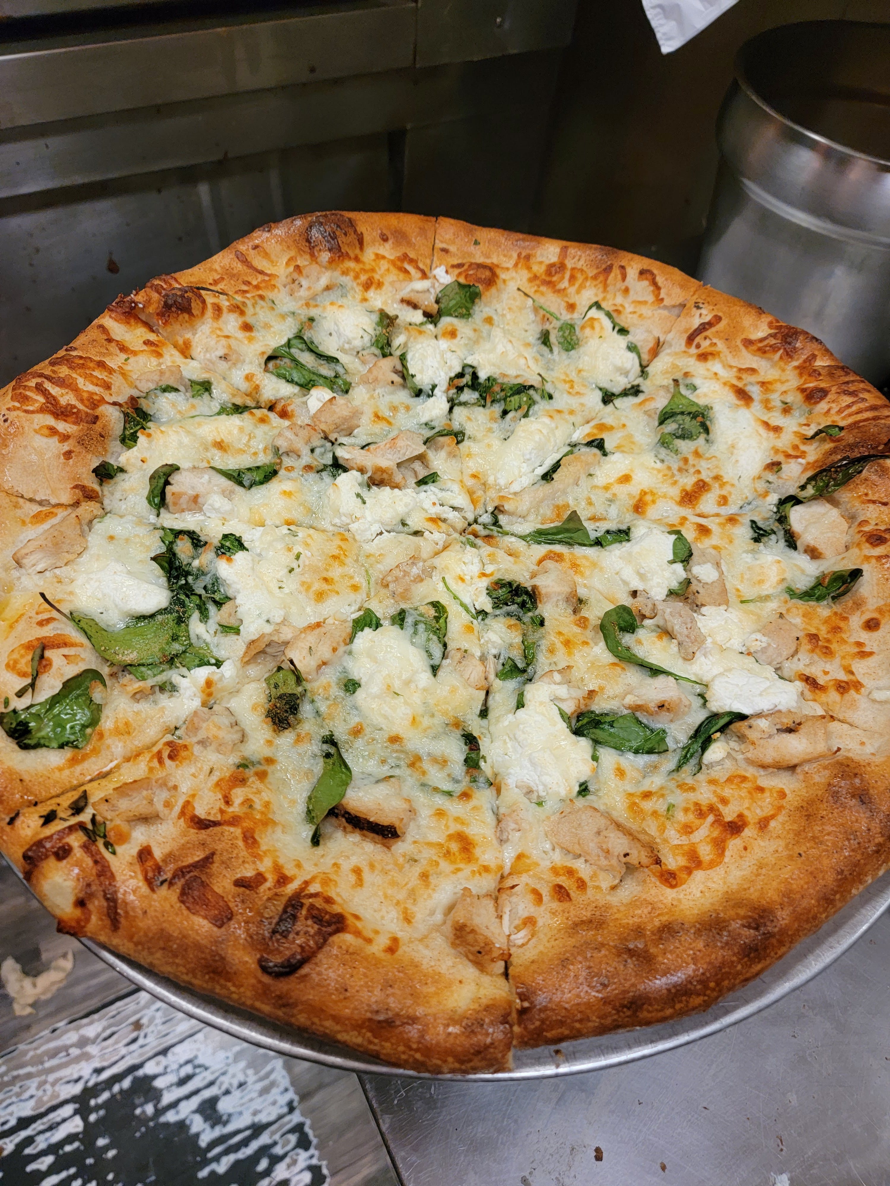 Order Spinach White Pizza - Small 12'' (8 Slices) food online from Giuseppe's Pizza Shop store, Plattsburgh on bringmethat.com