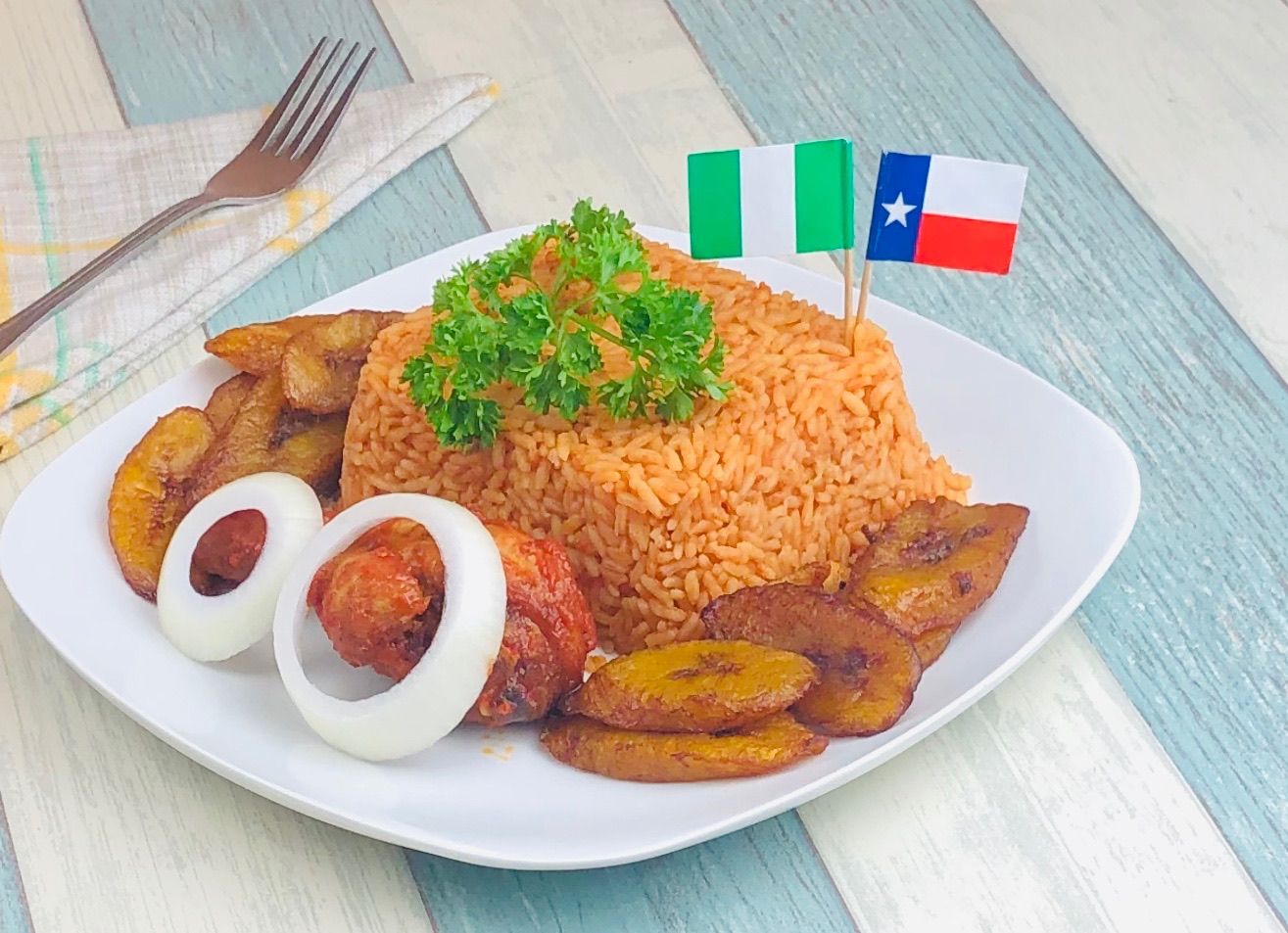 Order Jollof Rice food online from Royal Arm Restaurant African & Caribbean store, Katy on bringmethat.com