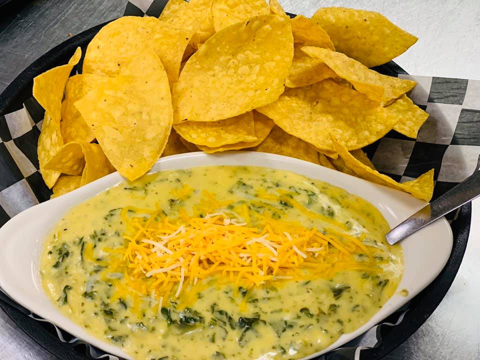 Order Spinach-N-Artichoke Dip food online from Mojo Pub -N- Grill store, Youngstown on bringmethat.com