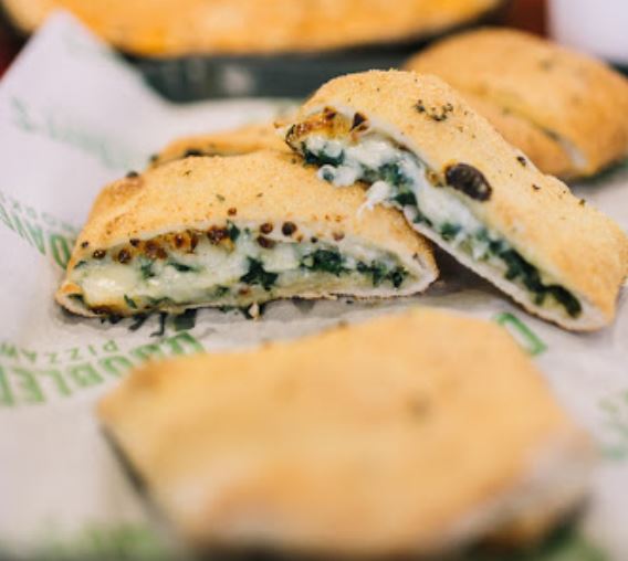Order Garlic Spinach Stromboli food online from Doubledave Pizzaworks store, Lakeway on bringmethat.com
