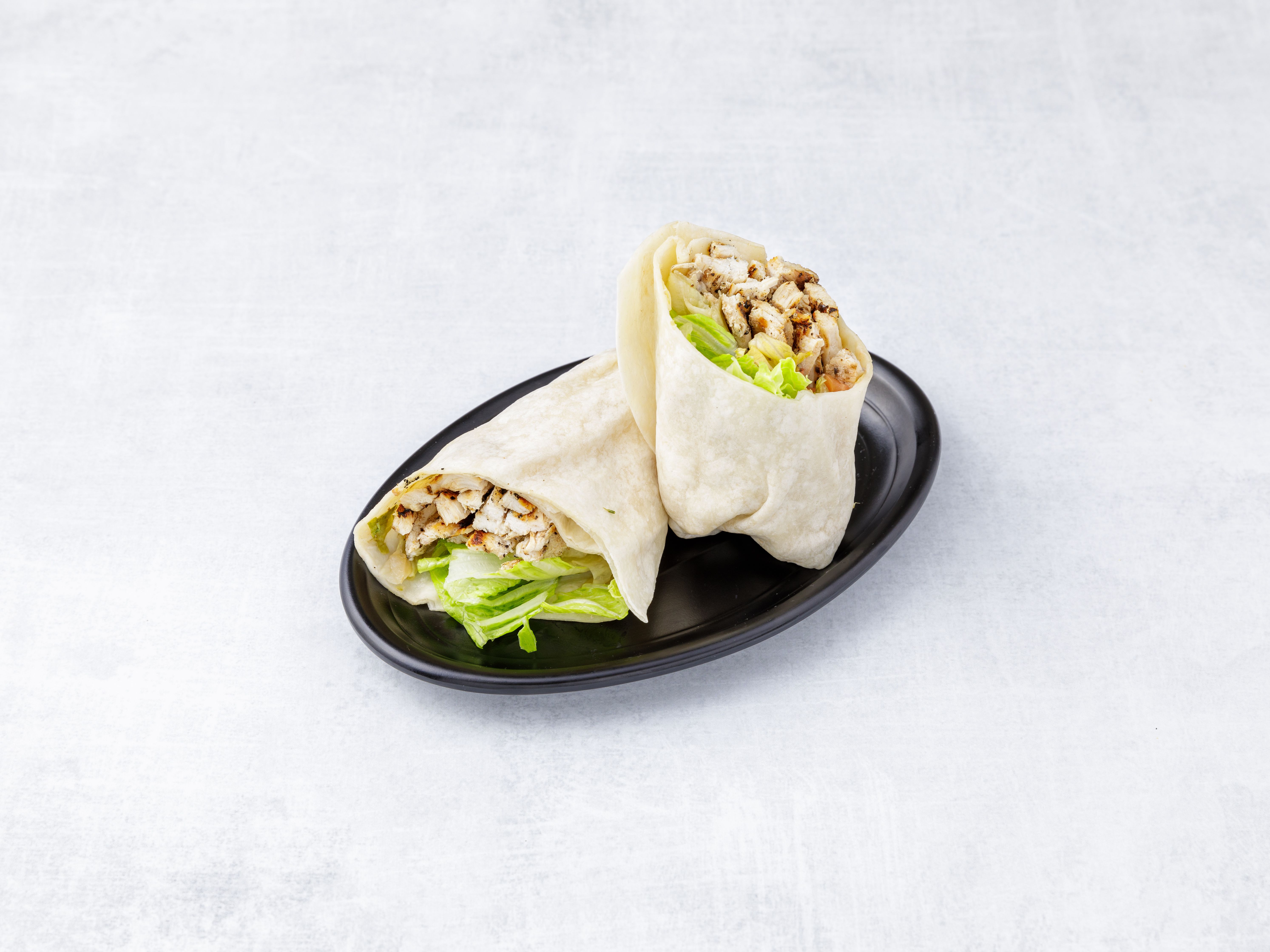 Order Grilled Chicken Wrap food online from Mario's Pizza store, New Rochelle on bringmethat.com
