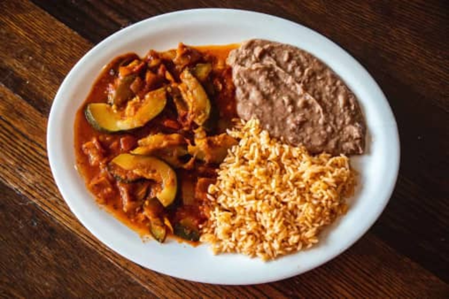 Order Calabacitas food online from La Veracruzana Mexican Restaurant store, Amherst on bringmethat.com